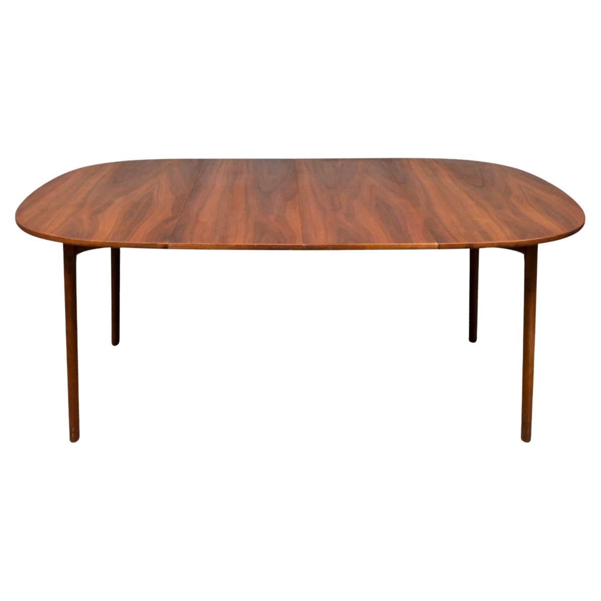 Superbe table de salle à manger danoise ronde moderne du milieu du siècle dernier, avec deux rallonges