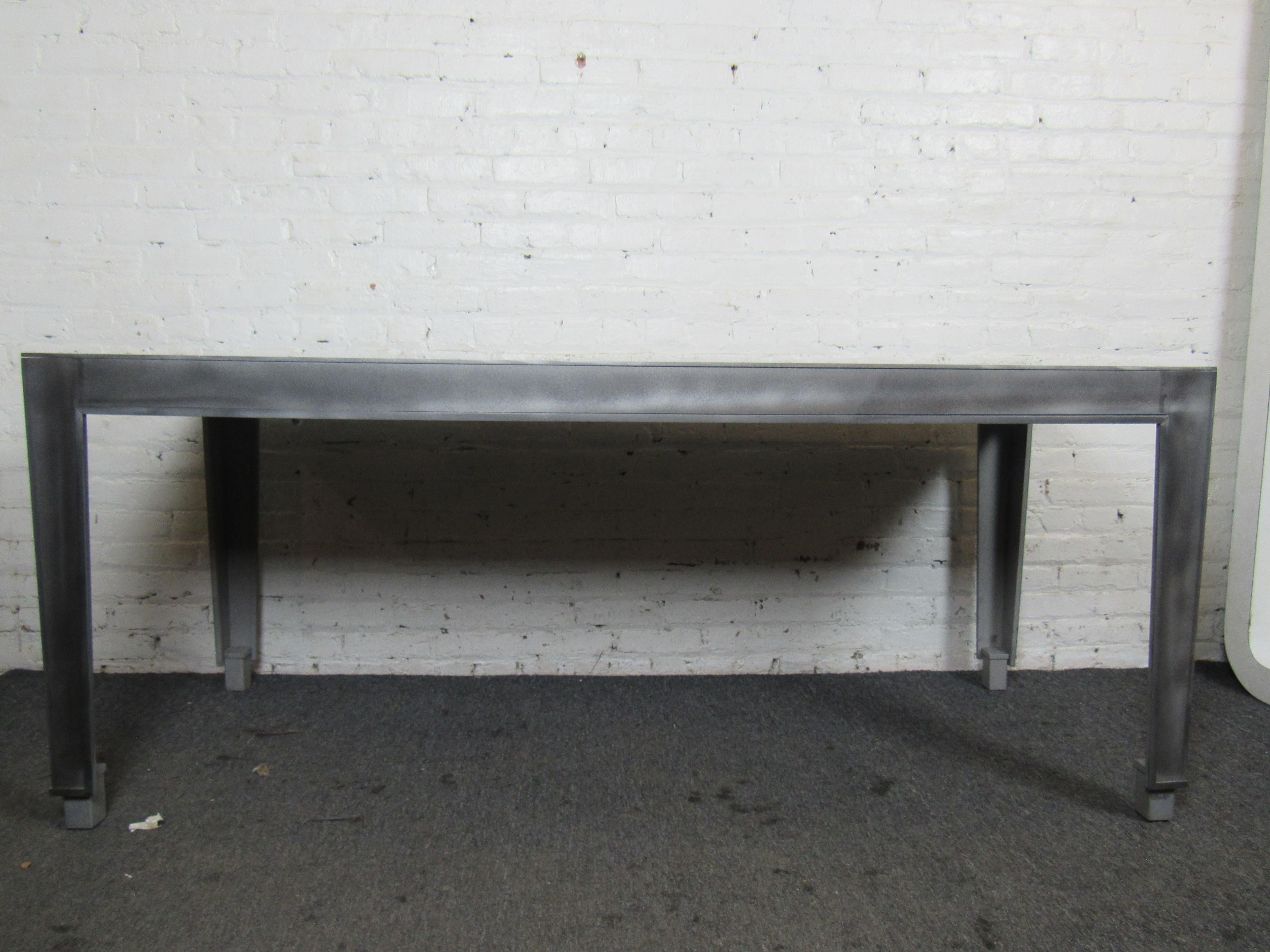 Gorgeous and unique century modern dining table. Rare that you find a table made of pure metal. This is a heavy but elegant piece bound to elevate any room. 
(Please confirm item location - NY or NJ - with dealer).
     