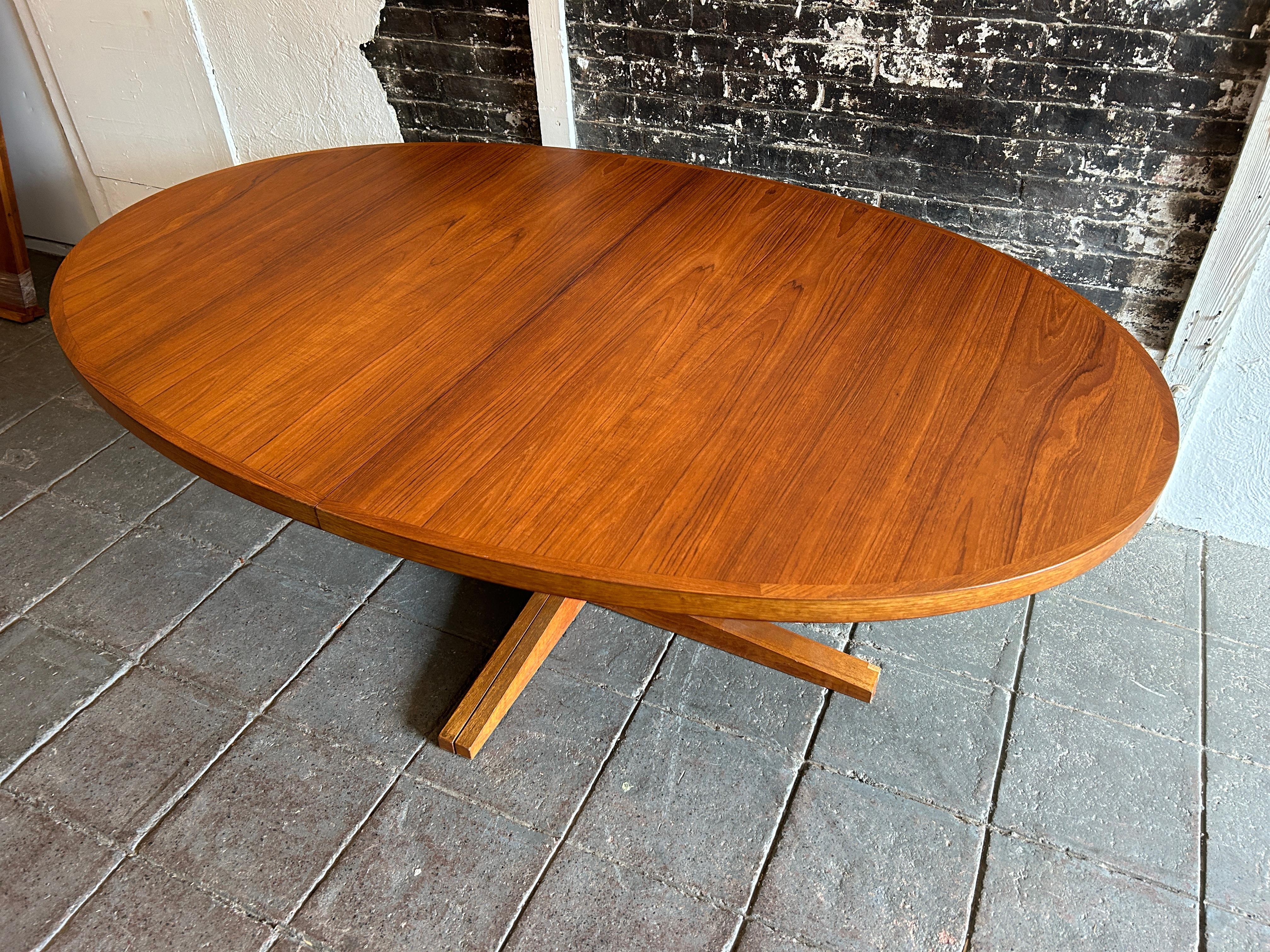oval dining table with leaf extension