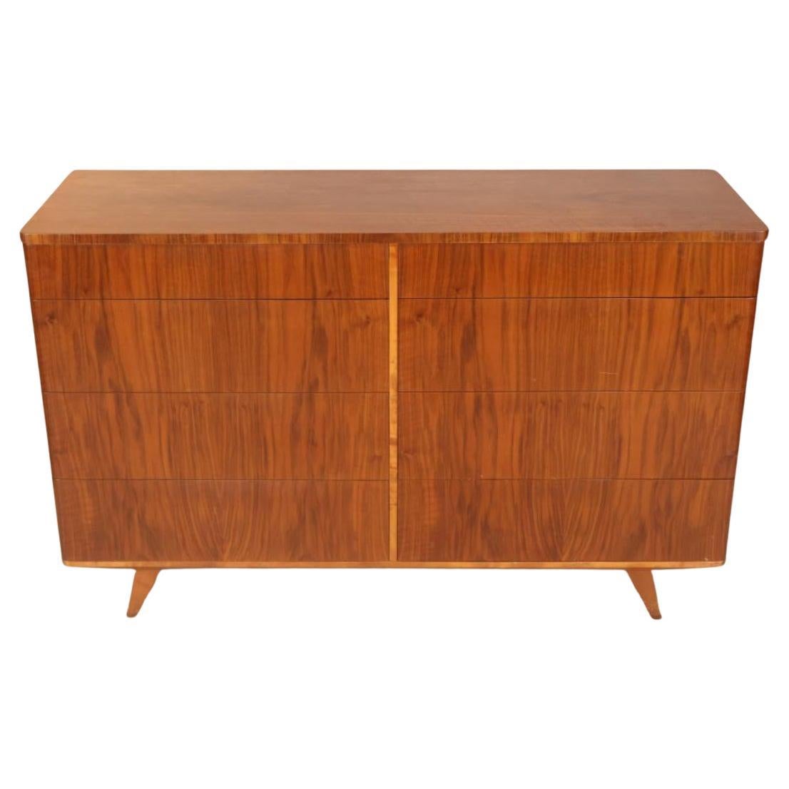 Stunning early deco mid century 8 drawer teak veneer dresser made in Sweden. Beautiful early deco style mid century dresser. Beautiful blonde birch wood drawer construction all clean and slide smooth. Great design with a stunning exotic teak veneer