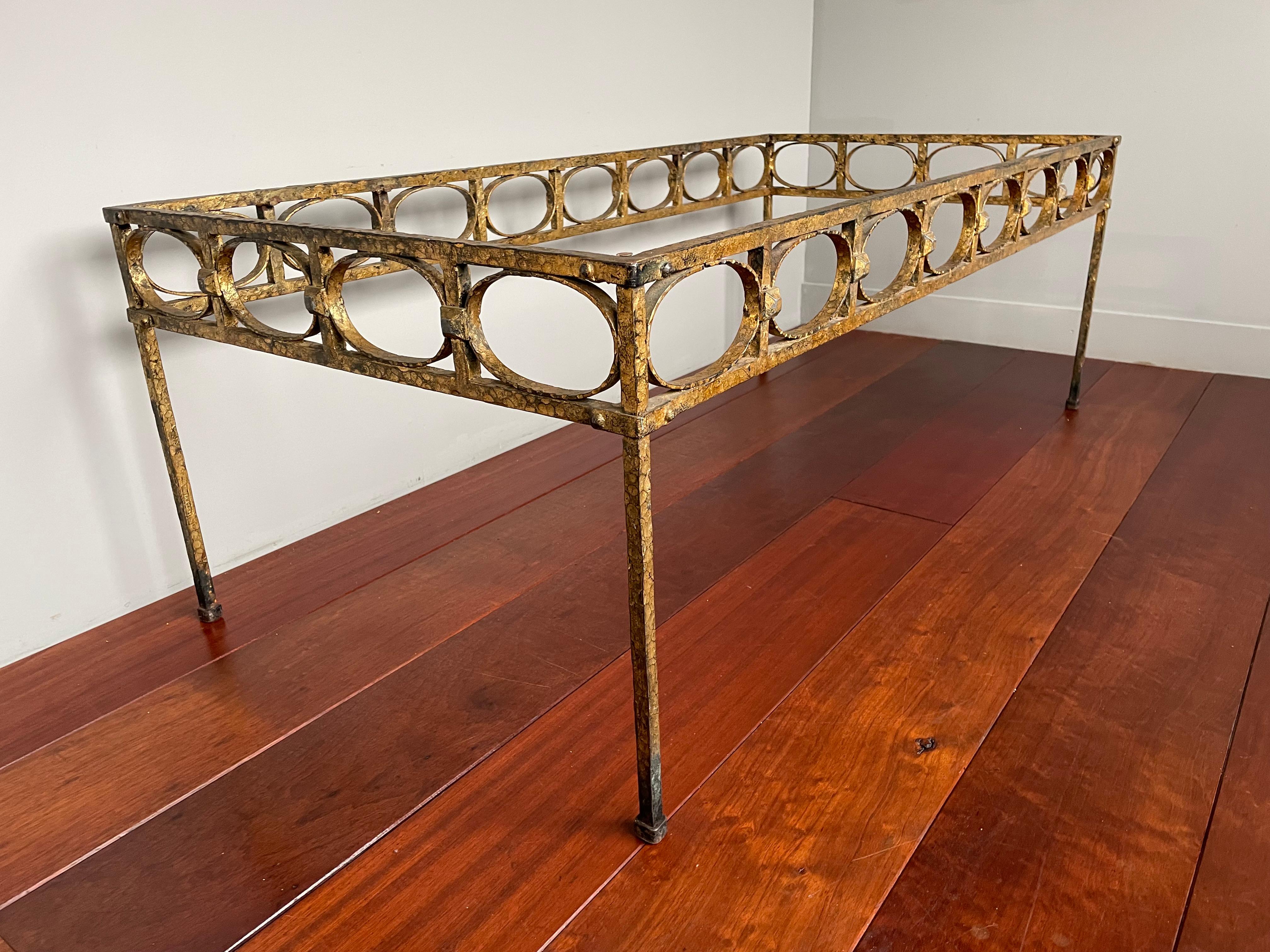 Very rare and truly stylish, hand forged and gilt, wrought iron coffee table base.

This beautiful design and uniquely hand-crafted table is by a known Spanish maker. To find such a truly unique, top quality made and ideal size coffee table base in