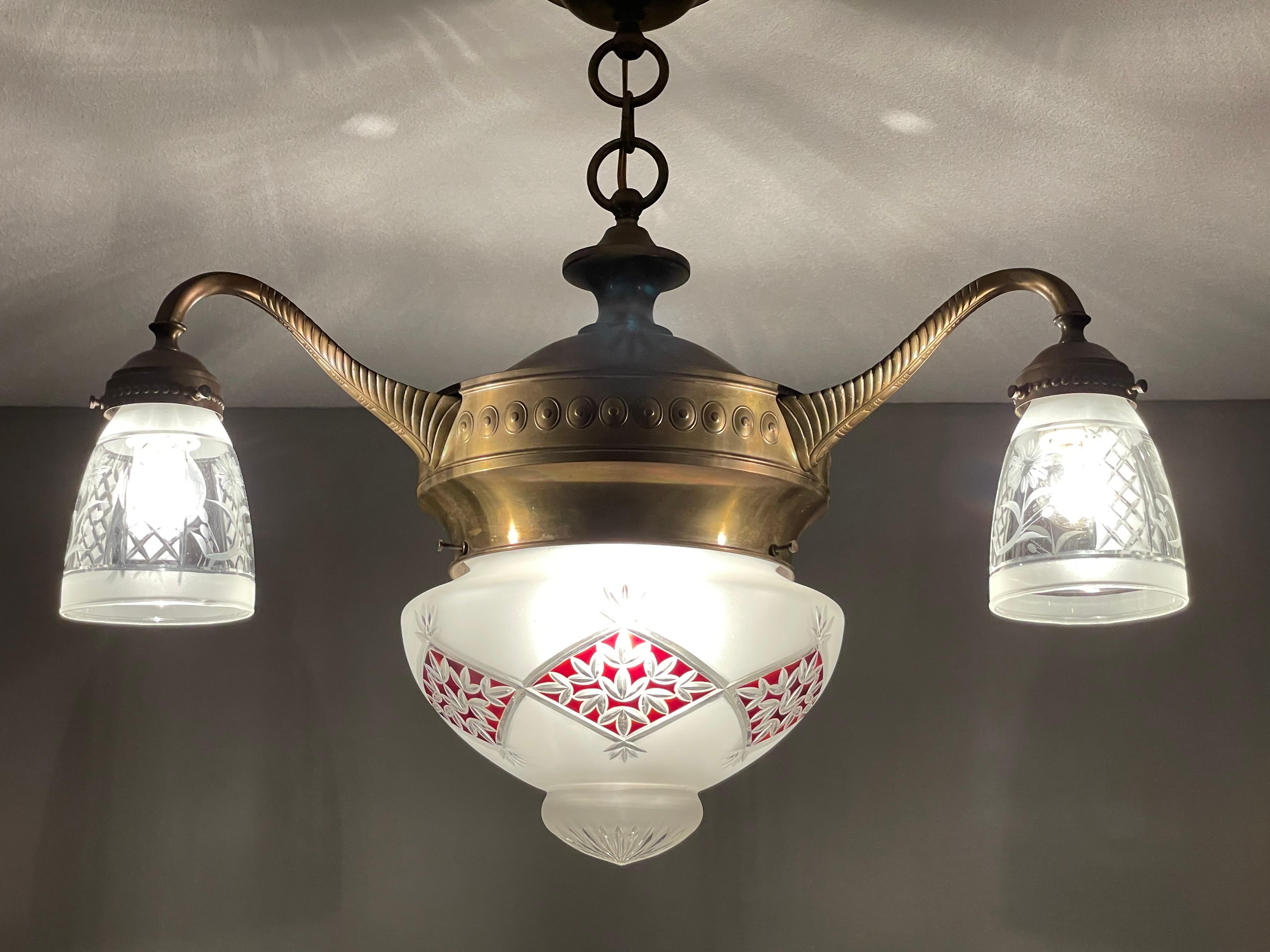 Perfectly handmade, European Arts and Crafts four-light chandelier.

If you are looking for a stylish and beautiful chandelier to grace your living space then this fine specimen from the earliest years of the 1900s could be yours to own and enjoy
