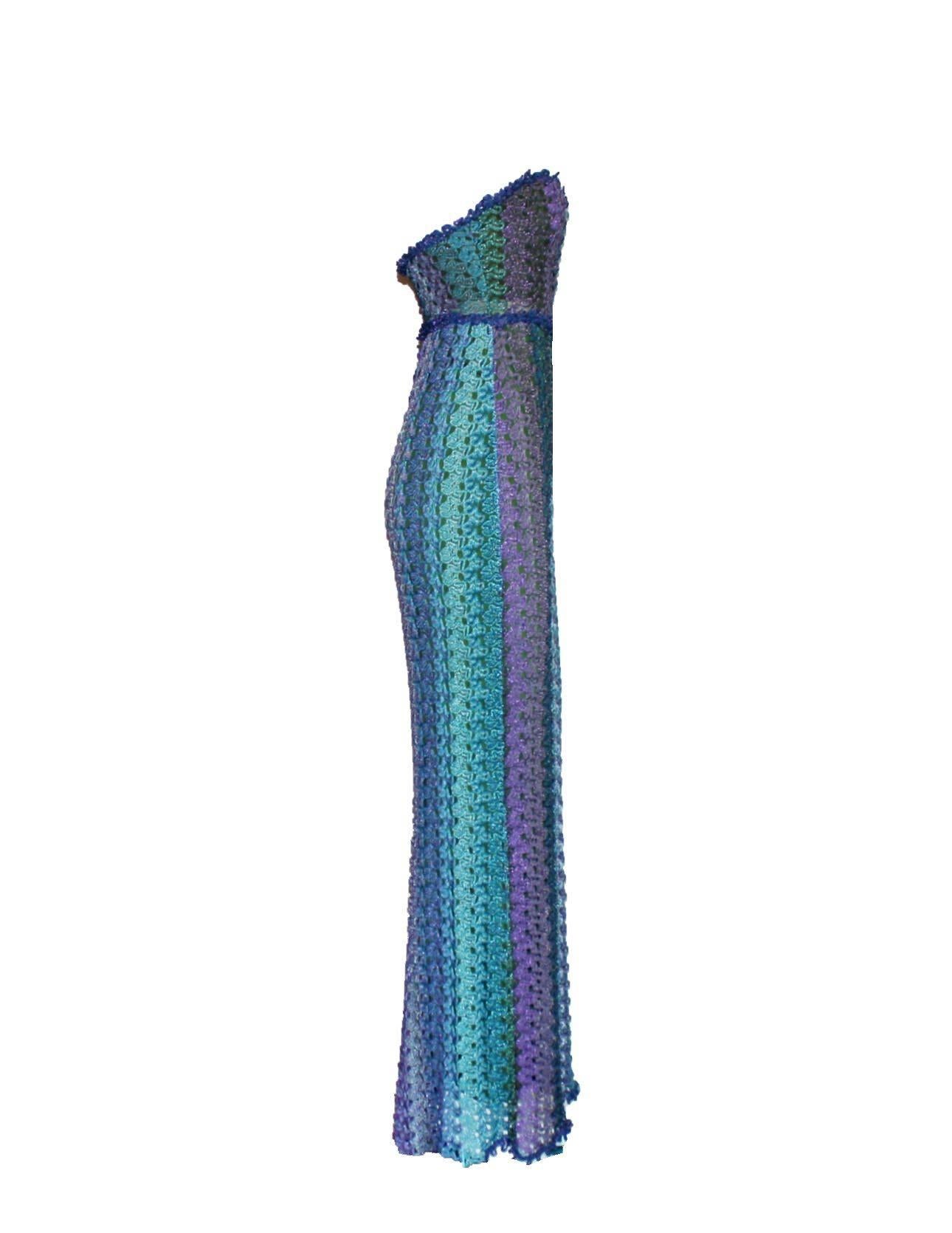 
Stunning evening gown by MISSONI
Unique Piece
Floor sweeping full length
Beautiful shiny lurex metallic threads woven in for a lustrous finish
Corset top for a perfect fit
Stunning aquatic colors
Fully lined in jade green silk
Made in Italy
Dry