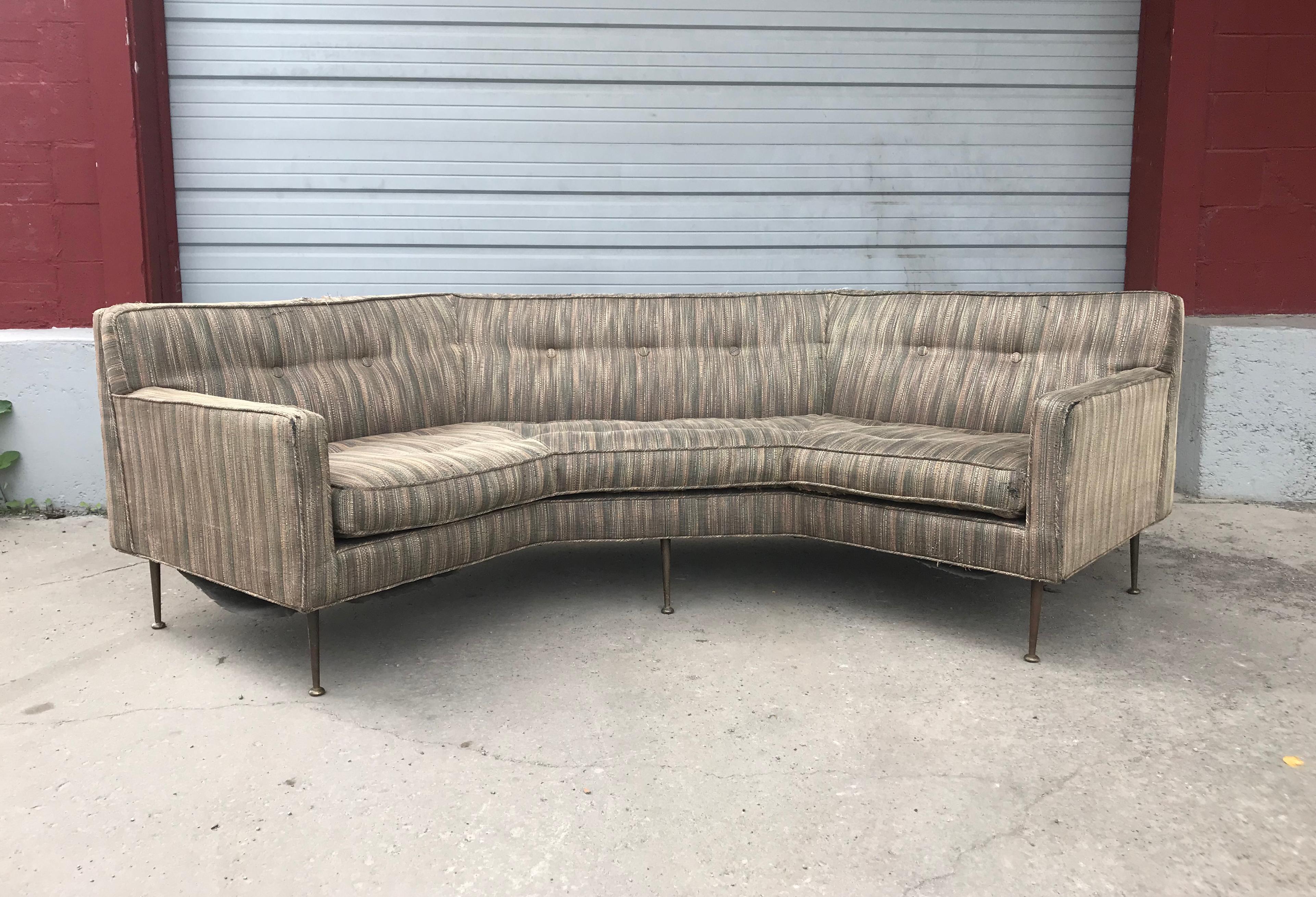 Stunning Modernist angled sofa attributed to Edward Wormley for Dunbar. Solid brass legs, Amazing quality, construction and design. Retains original fabric. in need or restoration.