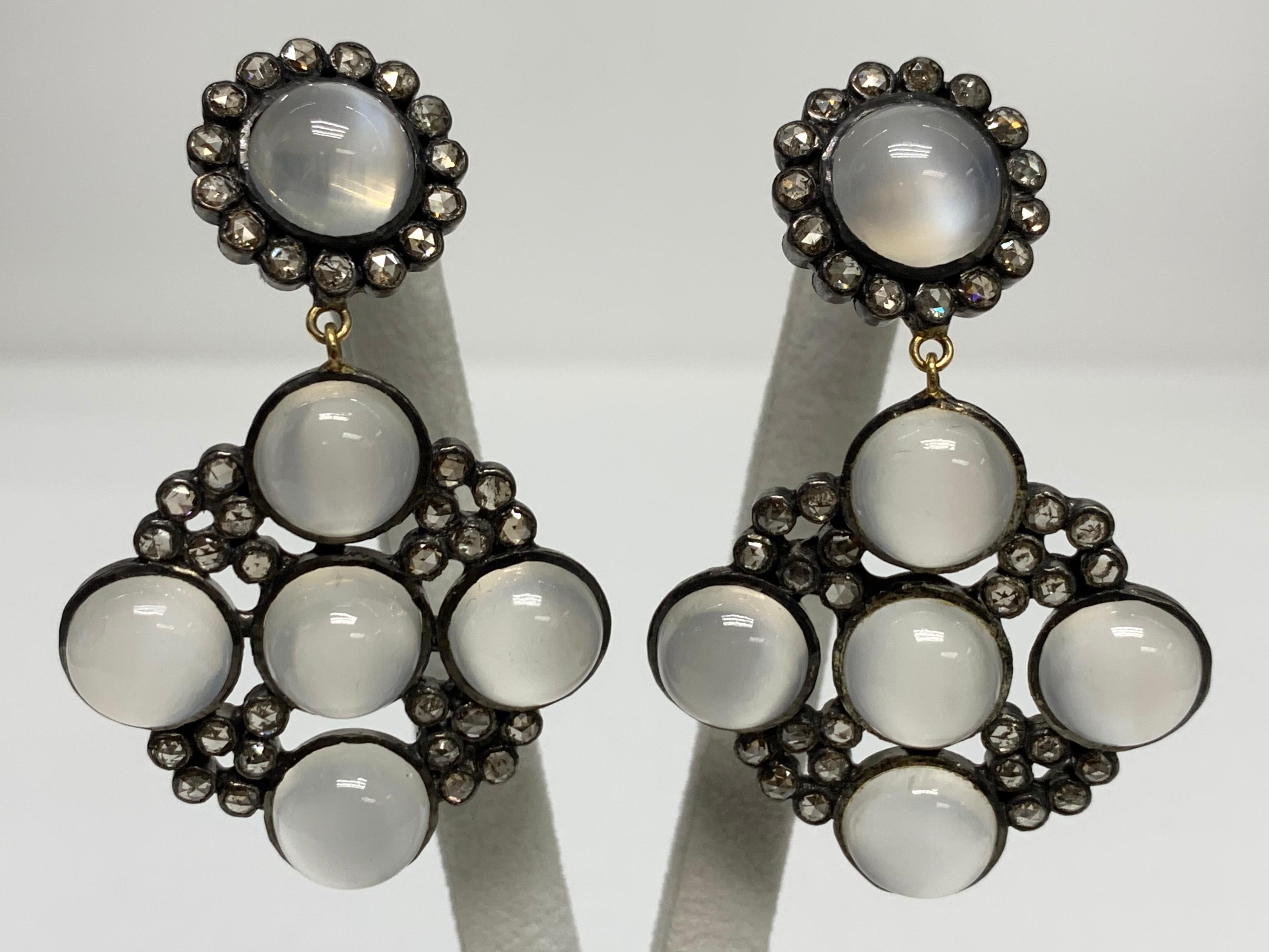 Moonstone & Champagne Diamond Earrings. 

Featuring a pair of Moonstone, Champagnes Diamond Earrings with a total weight of 2.33 carats, set in Oxidized Sterling Silver, Push Back Earrings. 

This one-of-a-kind pair of earrings was created by hand