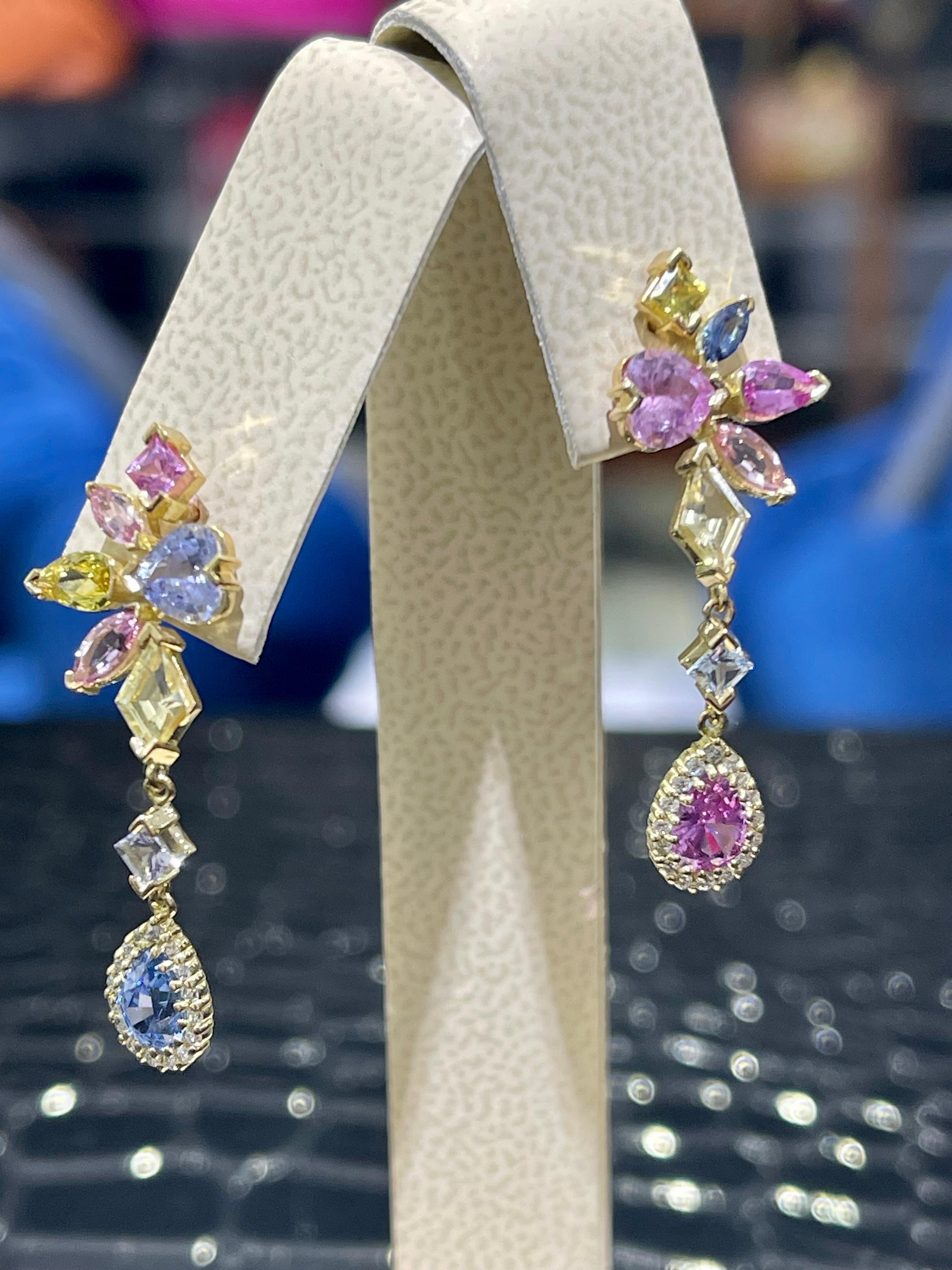 Multicolored Sapphires & Diamond earrings in 18k. 
3.93 carat total weight in blue, pink, yellow sapphires,
0.32 carat total weight in diamonds F color VS1 clarity.
Sapphires unheated, no treatment. Sri-Lanka origin.
Hanging length is 1.25”
