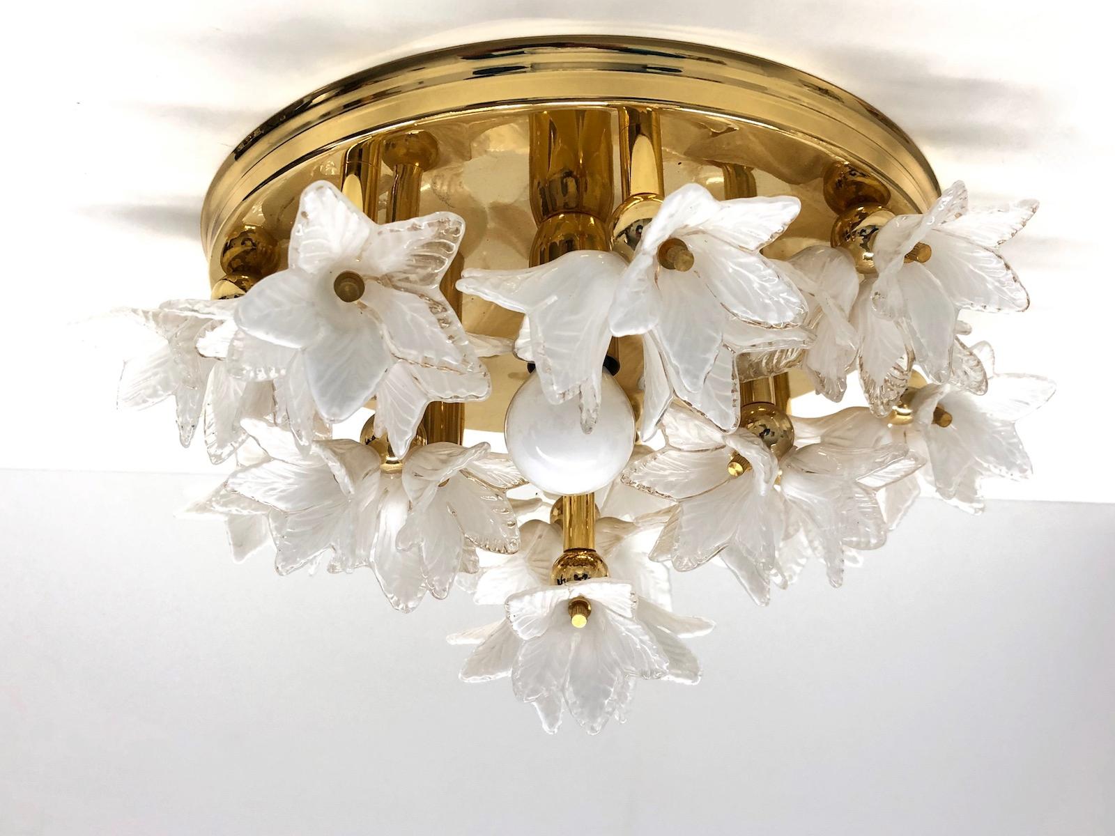 This Hollywood Regency style flush mount is made of Murano glass flowers, on a gold plated frame, it has three bulb holders. The fixture requires three European E14 candelabra bulbs, each bulb up to 40 watts. Bulbs are not included in this listing.