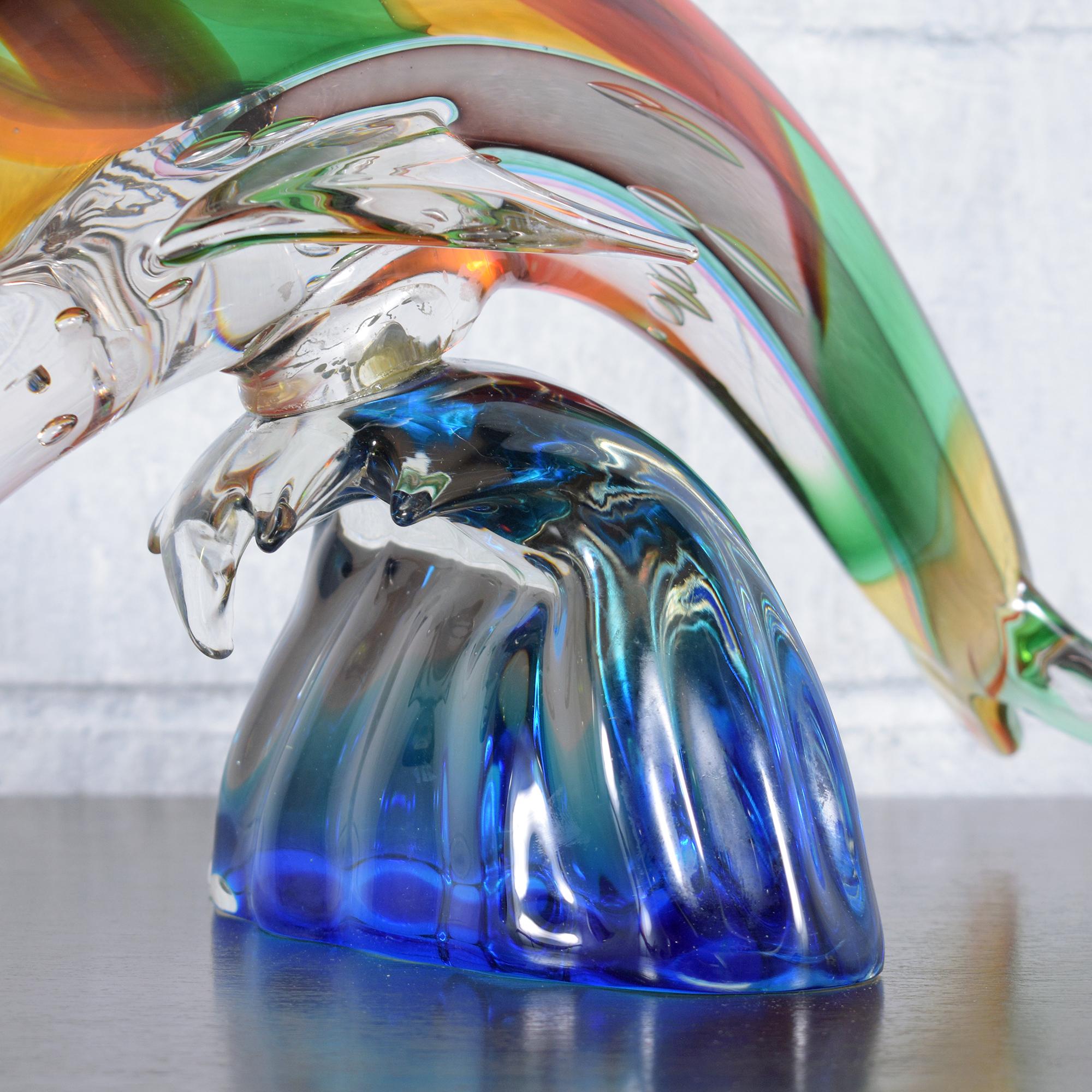 Italian Murano Glass Dolphin Sculpture on Blue Wave Base: Multicolored Artistry For Sale