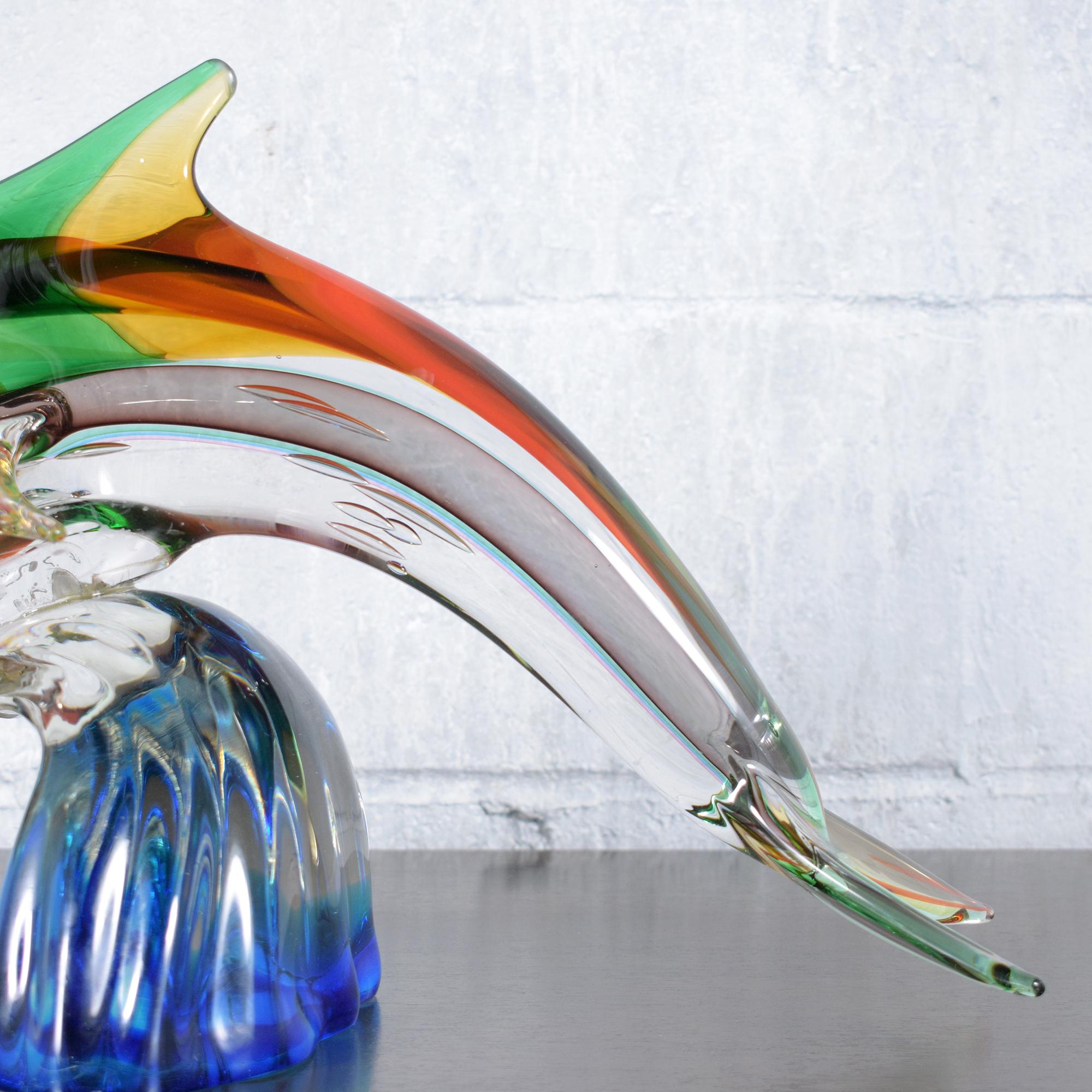 Hand-Crafted Murano Glass Dolphin Sculpture on Blue Wave Base: Multicolored Artistry For Sale