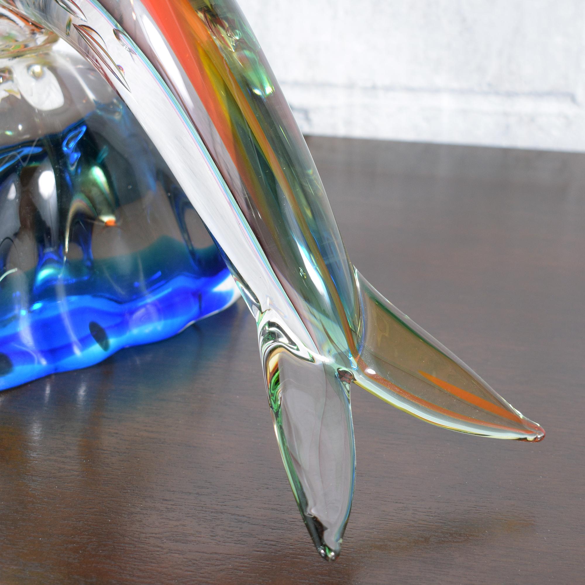 Murano Glass Dolphin Sculpture on Blue Wave Base: Multicolored Artistry In Good Condition For Sale In Los Angeles, CA