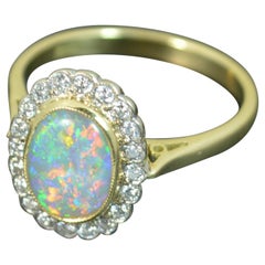 Stunning Natural Colorful Opal and Vs Diamond 18 Carat Gold Cluster Ring