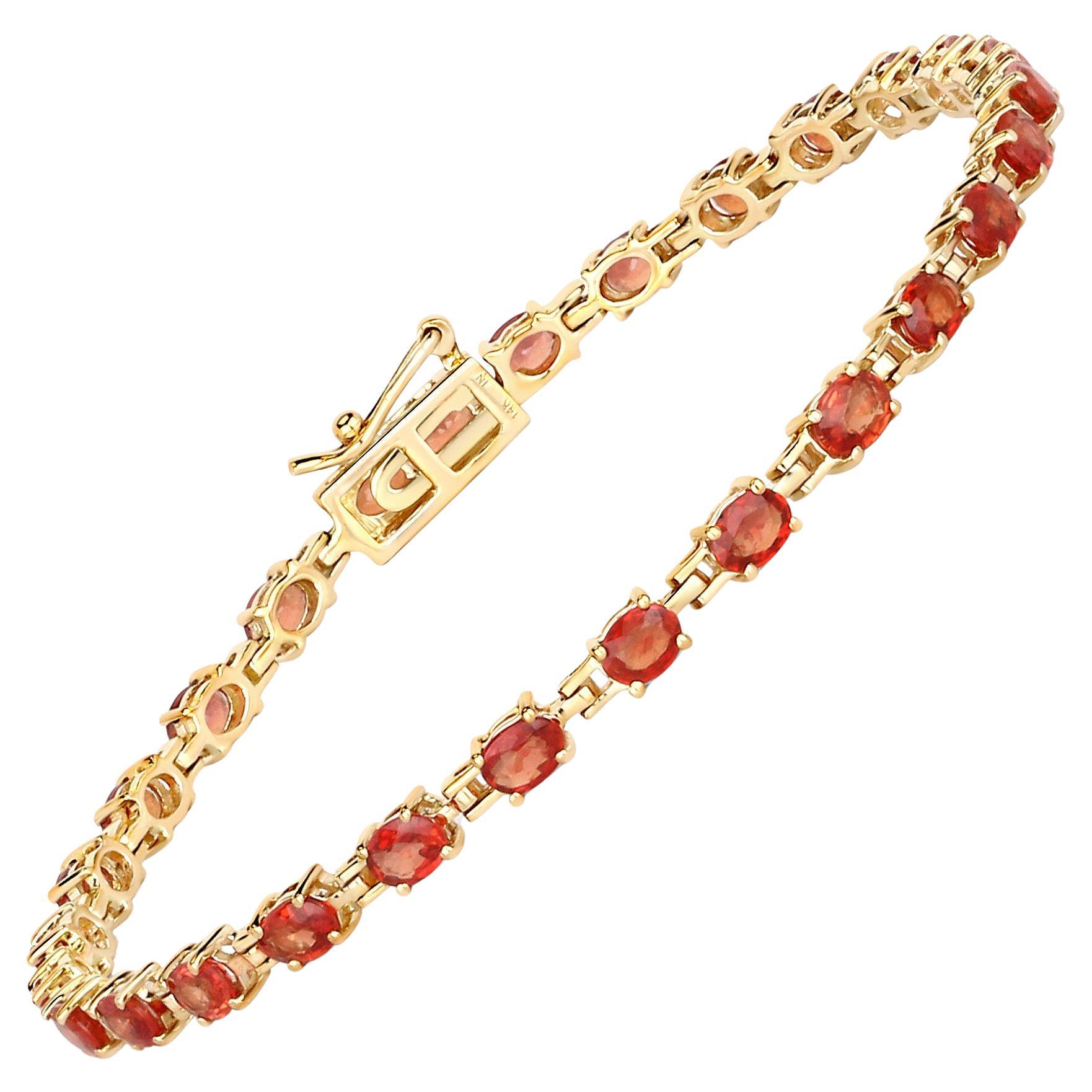 Taille ovale Superbe bracelet tennis en or jaune 14 carats avec saphirs rouges et orange naturels de 7 carats en vente