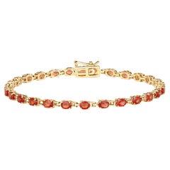 Stupendo bracciale tennis con zaffiro rosso arancio naturale 7 carati in oro giallo 14k