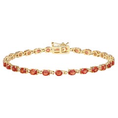 Atemberaubendes Tennisarmband mit natürlichem rot-orangefarbenem Saphir 7 Karat 14k Gelbgold