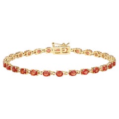 Stupendo bracciale tennis con zaffiro rosso arancio naturale 7 carati in oro giallo 14k