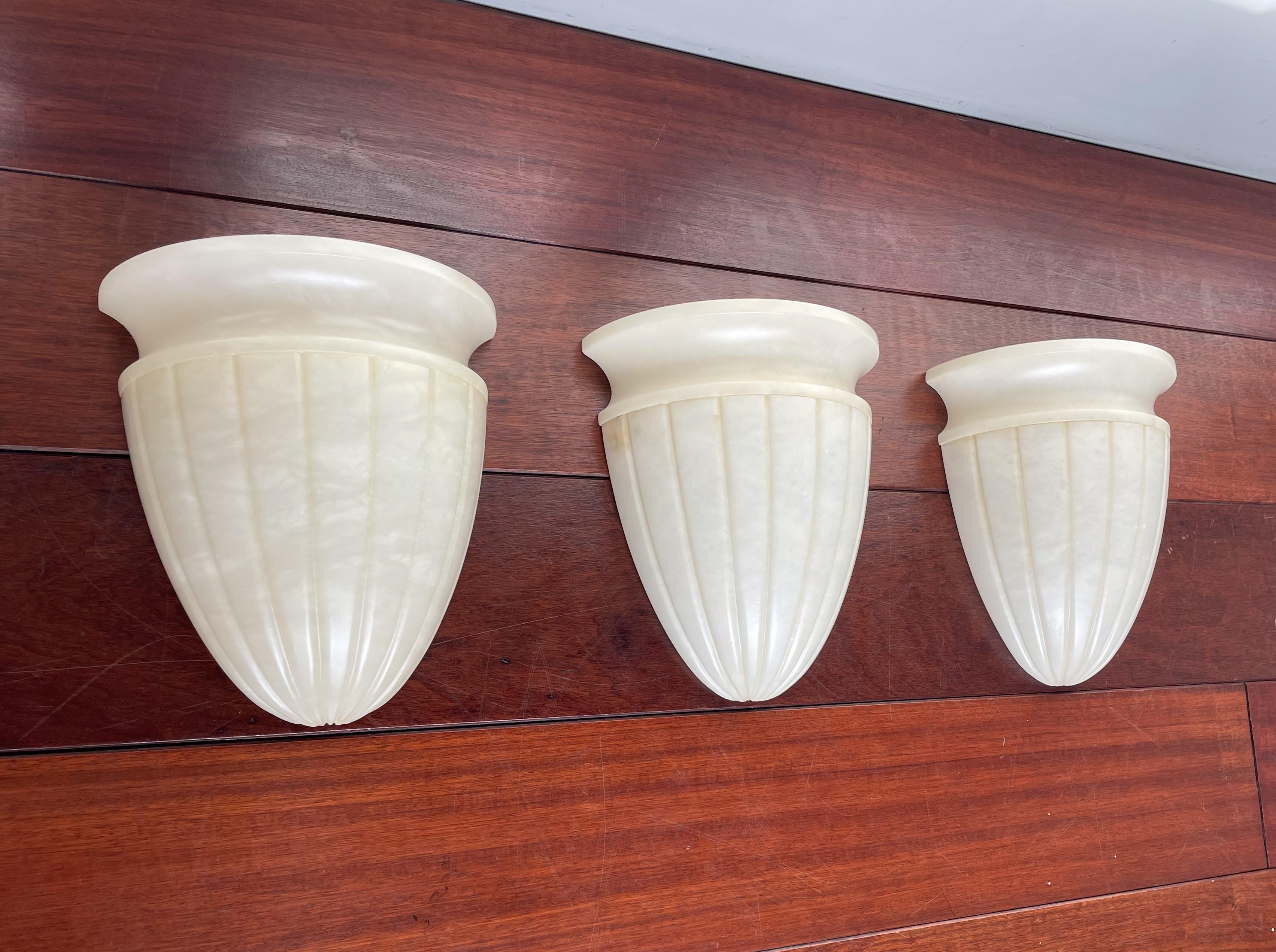 Best ever quality AND larger than normal alabaster wall lights.

Over the past 5 years we have seen our midcentury made and our antique alabaster fixtures become ever more popular both with interior designers and private buyers, and for good