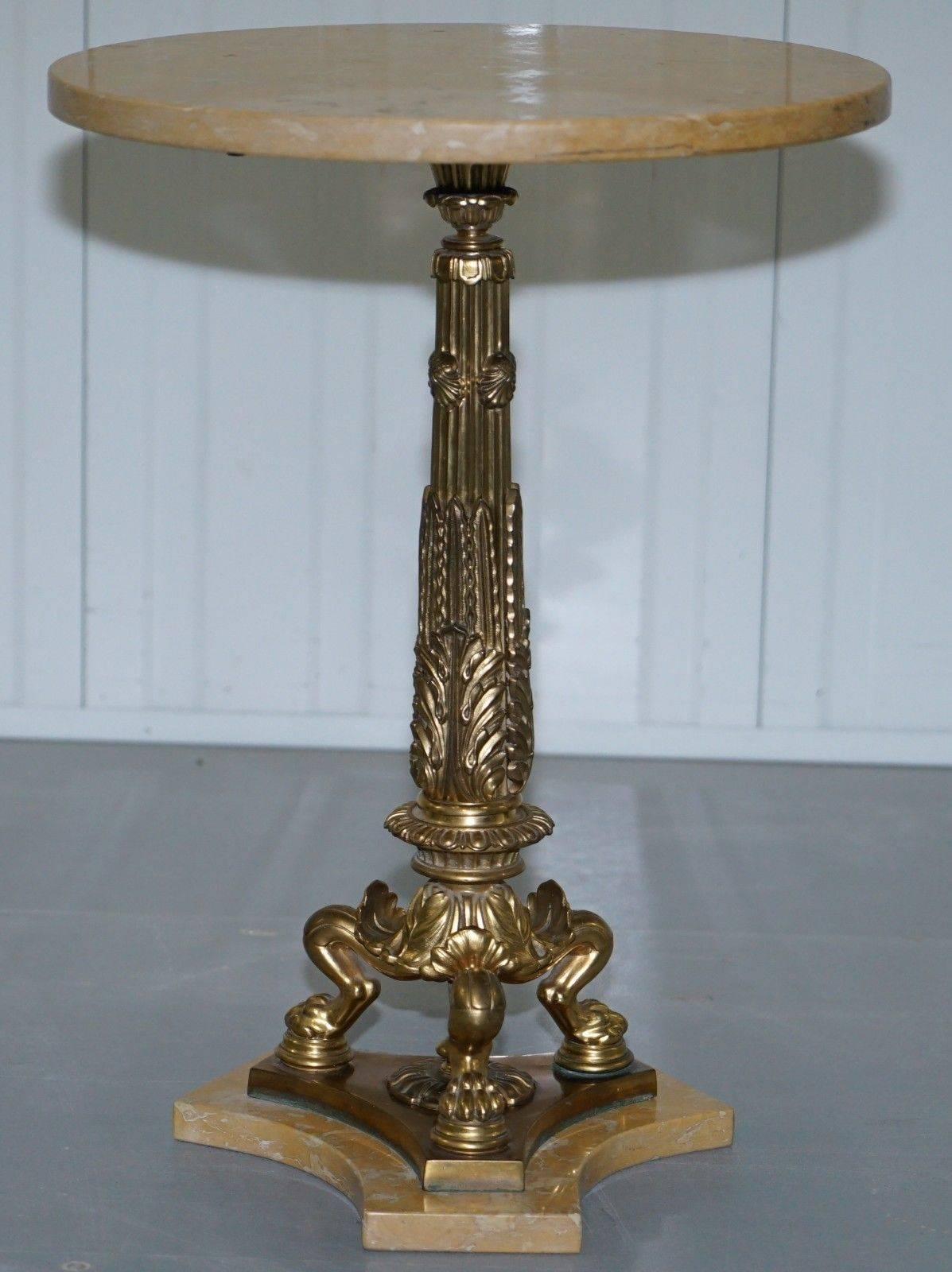 We are delighted to offer for sale this stunning solid marble topped and brass pillared base finished with decorative legs side table

A very good looking and well-made piece, the marble has a subtle and stylish grain, the base is very grand and