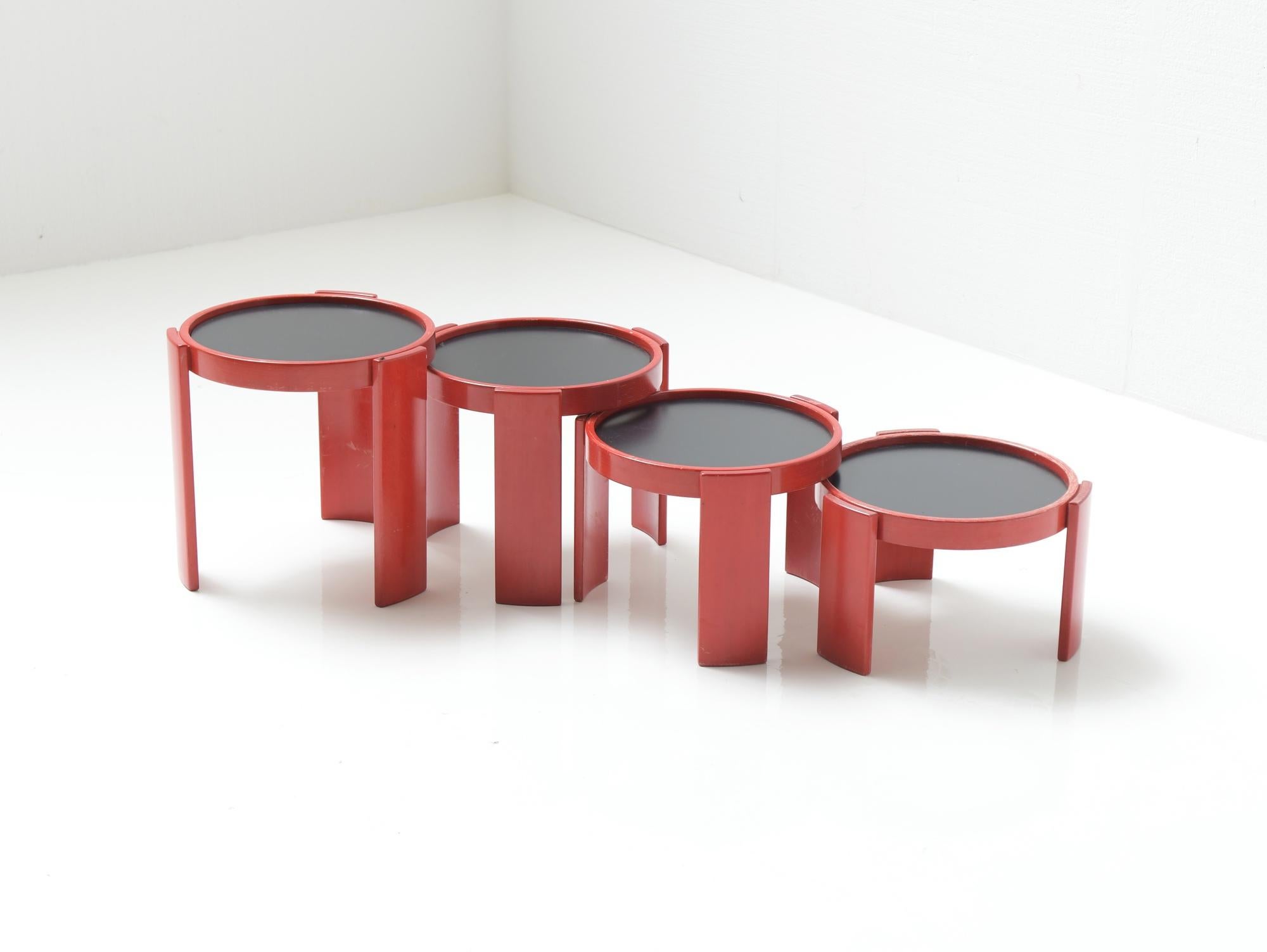 Stunning nesting tables (model 780) by Gianfranco Frattini for Cassina, 1960s.
Still 100% original in a very rare red color.

The 4 pieces have their CASSINA label.

Only sold as a set.

Dimensions :
w42 x h39 cm