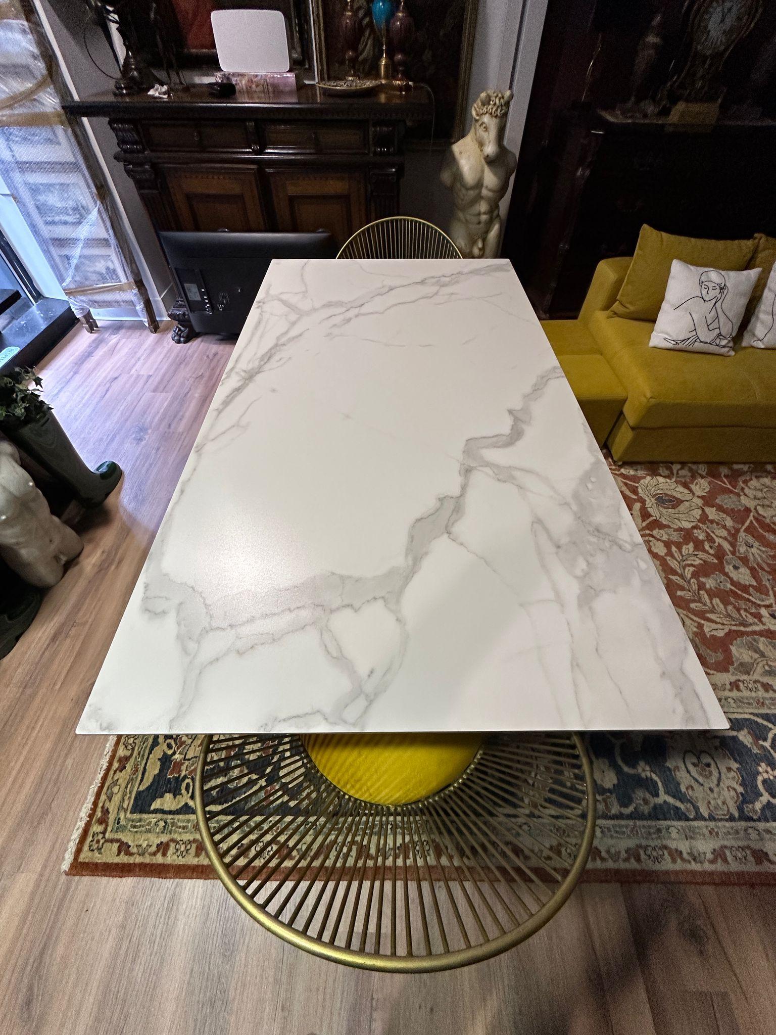 Stunning NEW  Rectangular White Porcelain Table 180cm x 100cm

The 180cm table in question is the perfect combination of style and durability. Its white porcelain top, highly resistant to wear, extreme temperatures and waterproof, brings light and