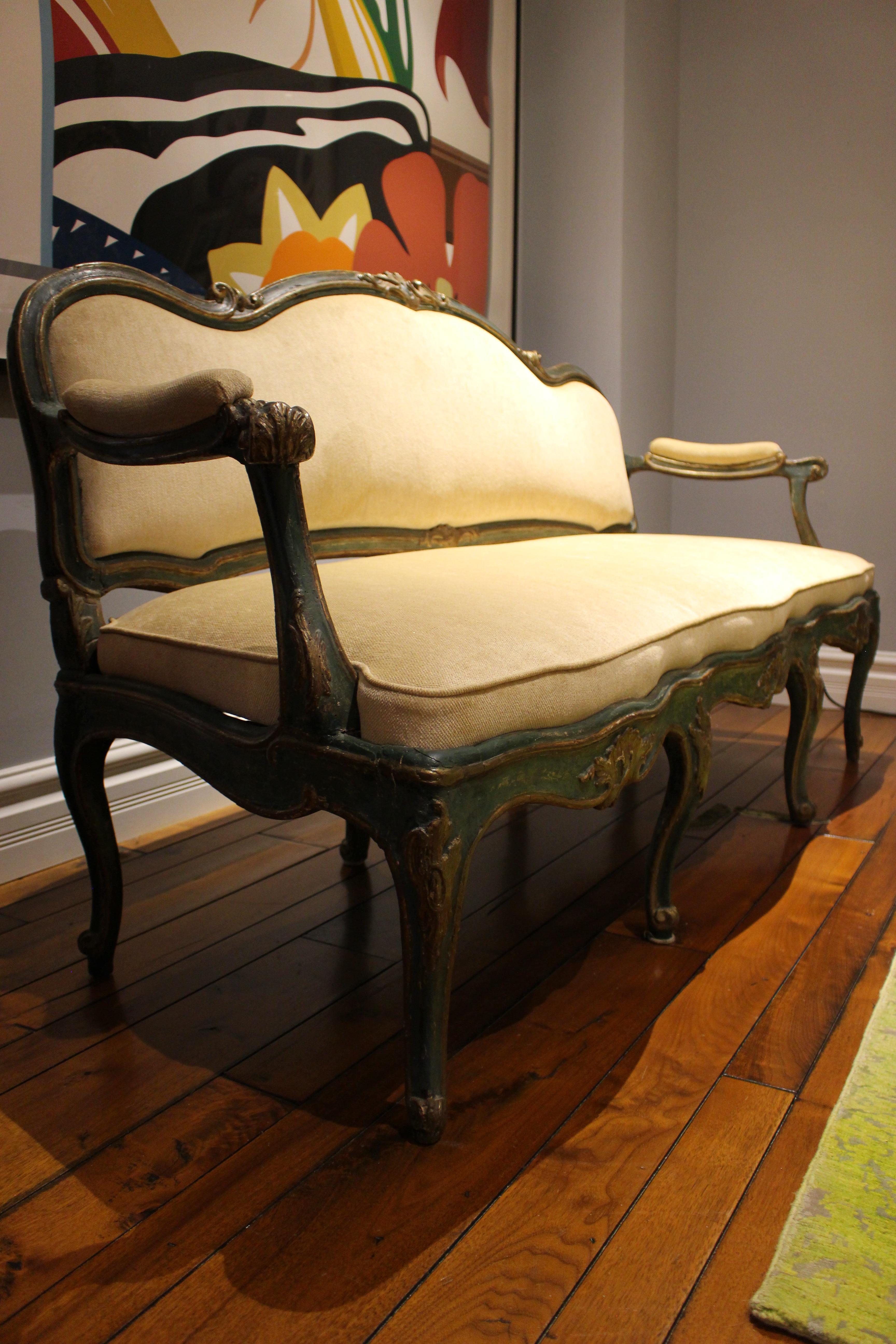 Stunning North Italian green-painted and parcel-gilt settee. Mid 18th Century.