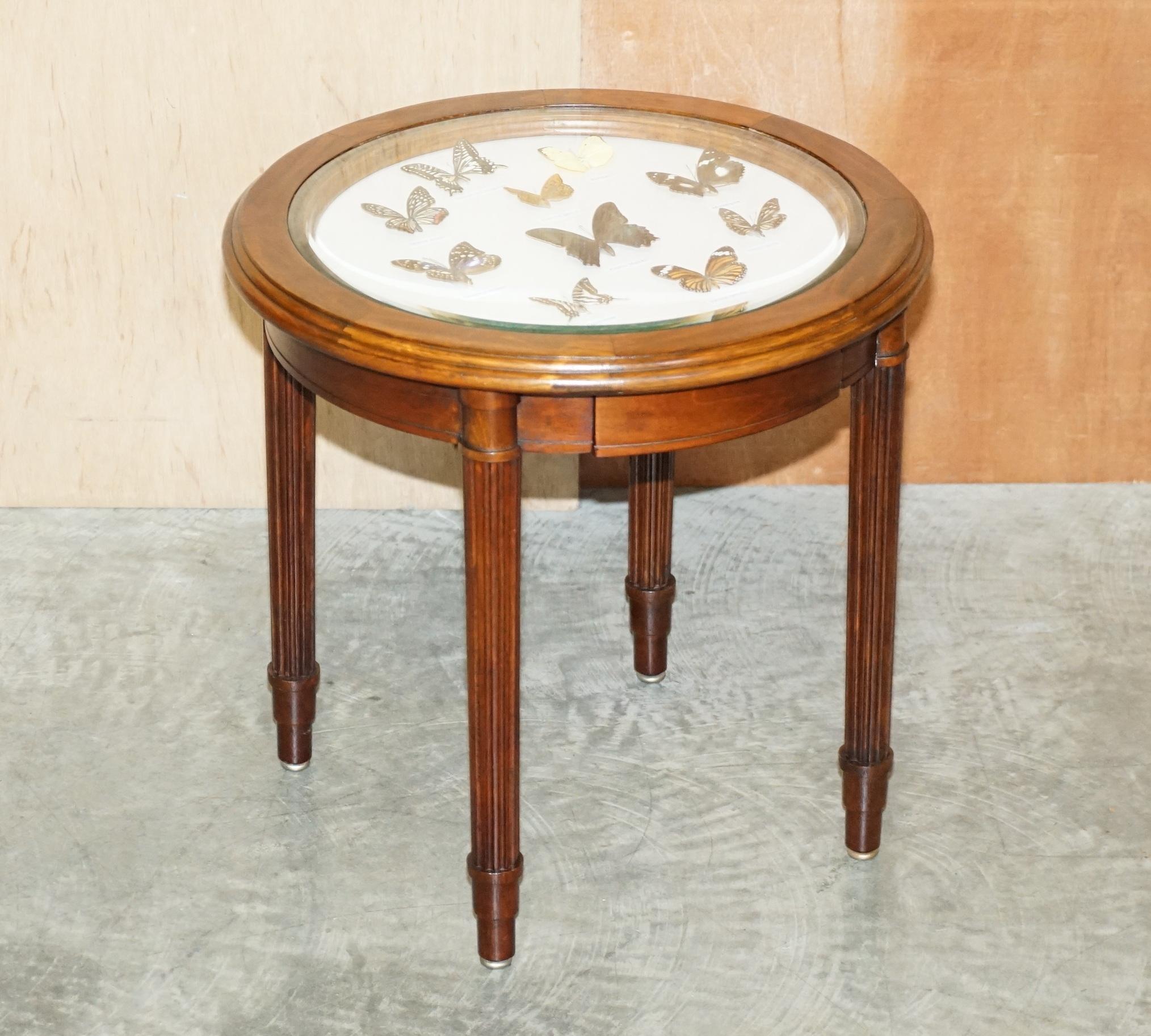 We are delighted to offer this lovely original light mahogany side table with Butterfly Entomology display

A good looking and well made piece, this is just about as decorative a table as you will find anywhere, it has a wonderful display of