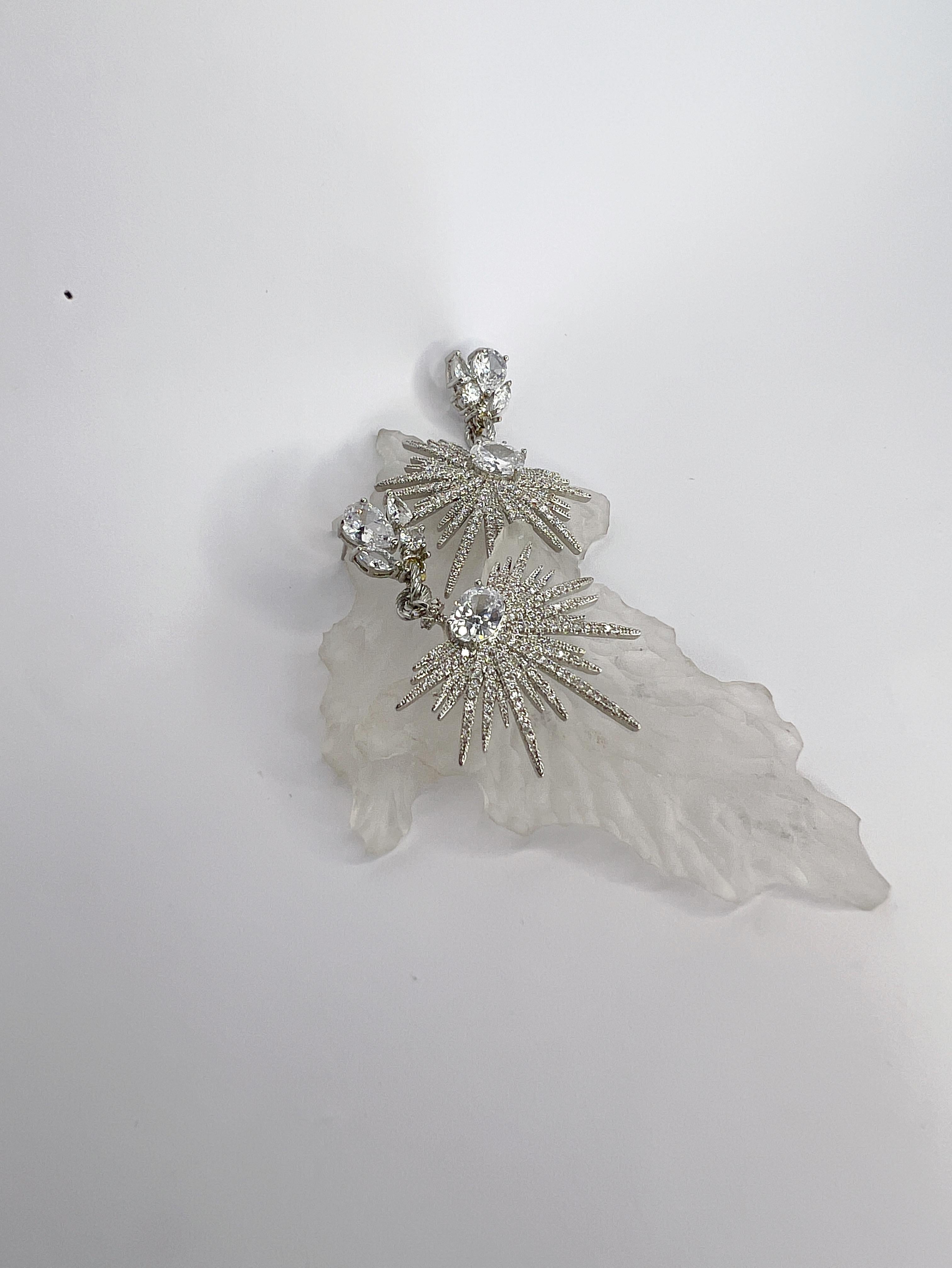 Briolette Cut stunning one of a kind Swarovski and hand carved recycled plastic earrings For Sale