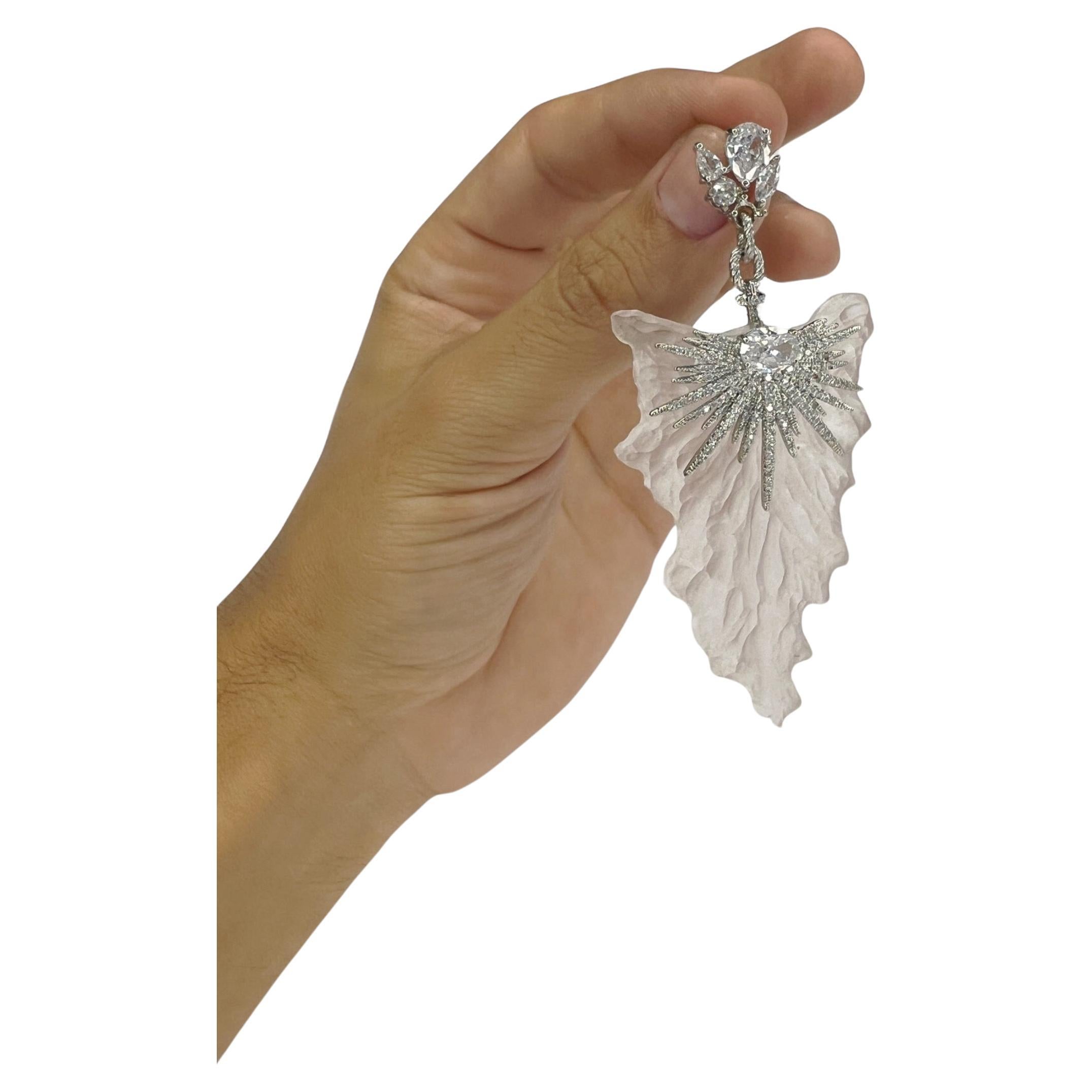 stunning one of a kind Swarovski and hand carved recycled plastic earrings For Sale