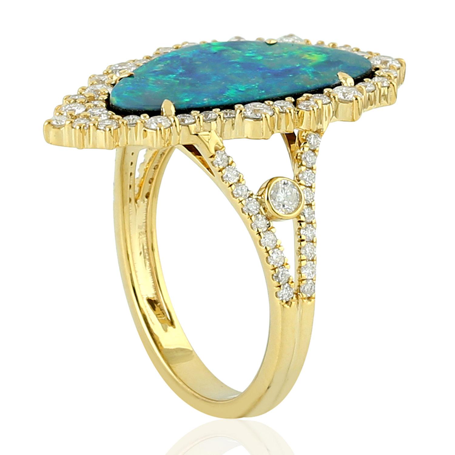 Stunning Opal and Diamond Ring in 18k Yellow Gold can be wore during any day or night time occasion.

Ring Size: US-7

18KT Gold: 4.437gms
Diamond: 0.91cts
Opal: 3.20cts
