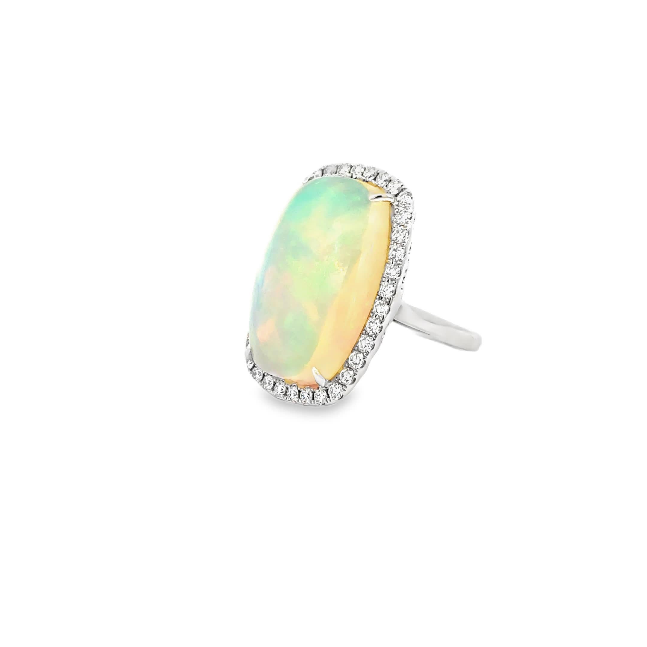 Stunning Opal Ring with Diamond Halo In New Condition For Sale In Great Neck Plaza, NY