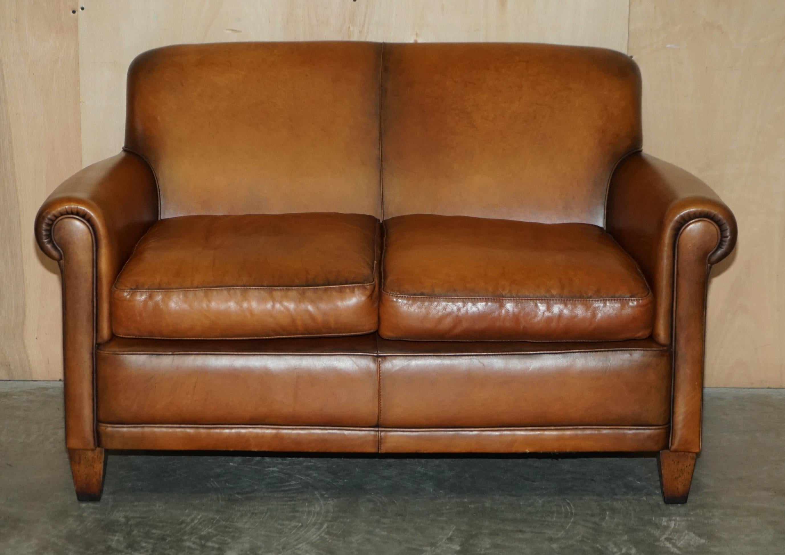 We are delighted to offer for sale this lovely Laura Ashley Burlington brown leather two seat sofa with original label under the seat

The sofa is very comfortable, a perfect size and a lovely colour which is heritage brown, it has fibre filled