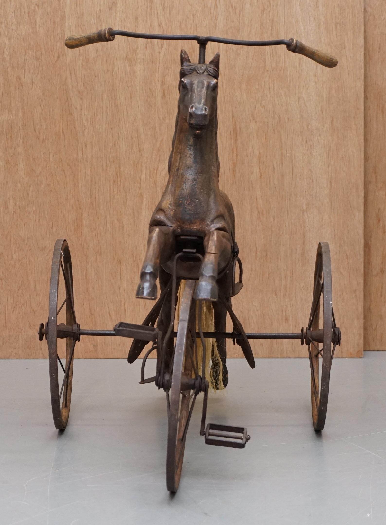 We are delighted to this lovely original Victorian children’s horse tricycle

A very well made, decorative and functional piece of Folk Art. This tricycle is the most original example I’ve come across with period stirrups, pedals, saddle and