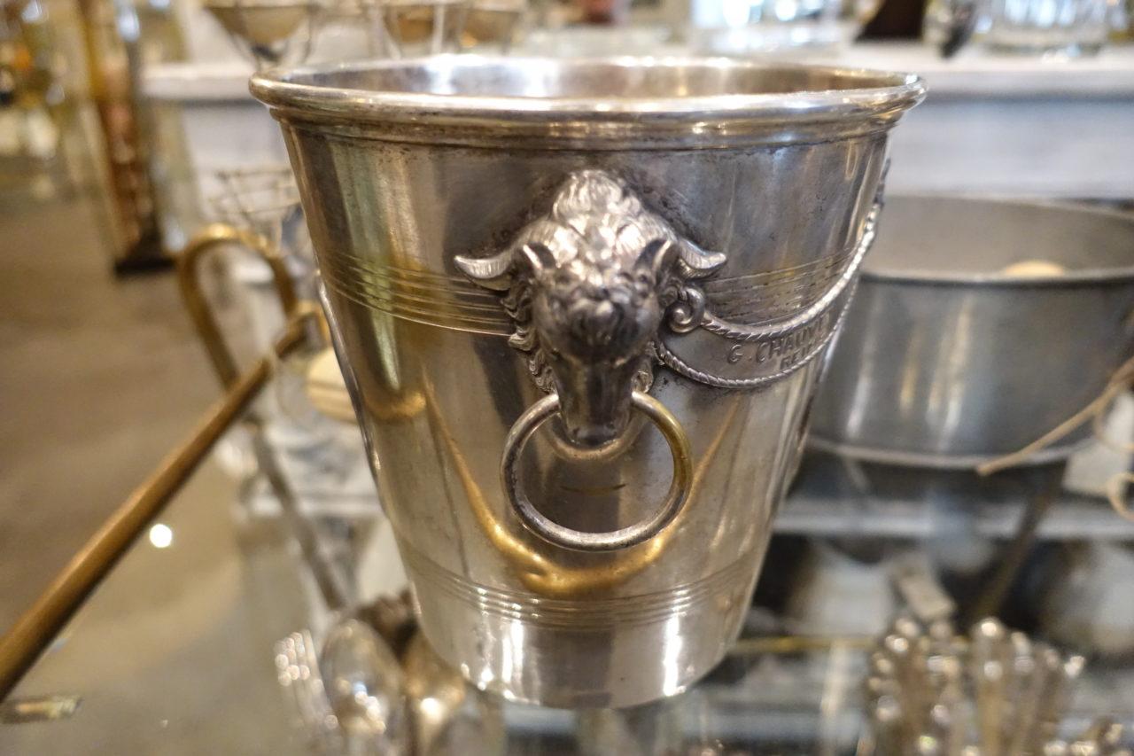 Superb and seldom seen vintage French champagne / wine ice bucket, from the old champagne house of G. Chauvet, whose roots go back to the 1880s. This treasure is beautifully decorated with splendid regal rams heads and with two elegant emblems