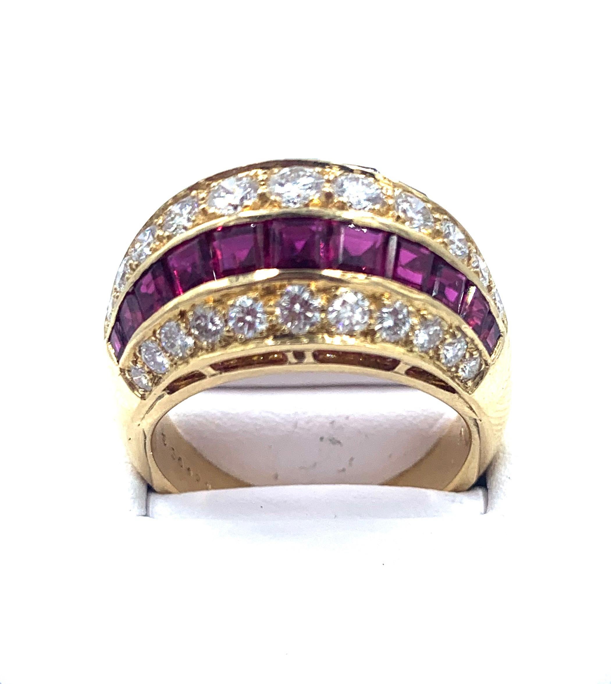 This Stunning Ruby and Diamond Dome Ring is the work of Oscar Heyman, a name known and appreciated by jewelry connoisseurs around the world. This beautiful dome-style ring features three rows of bright set diamonds weighing 1.87cts and two rows of