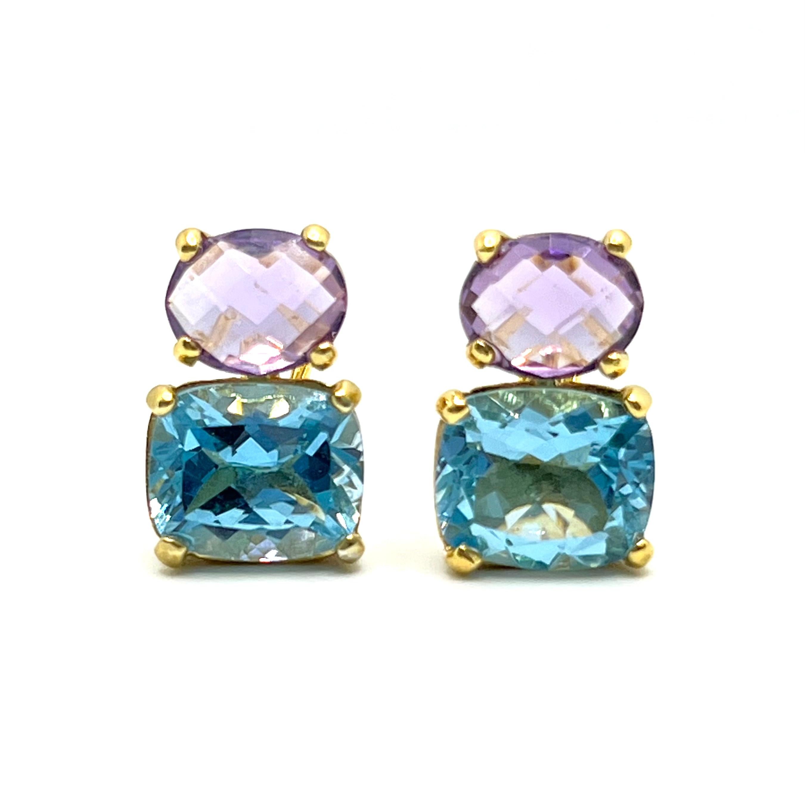 These stunning pair of earrings features a pair of genuine oval briolette-cut amethyst with cushion-cut sky blue topaz, handset in 18k yellow gold vermeil over sterling silver. The double blue combination creates stunning two-tone blue-purple hue!