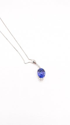 Stunning Oval Cut Tanzanite Pendant with Dazzling Diamonds
