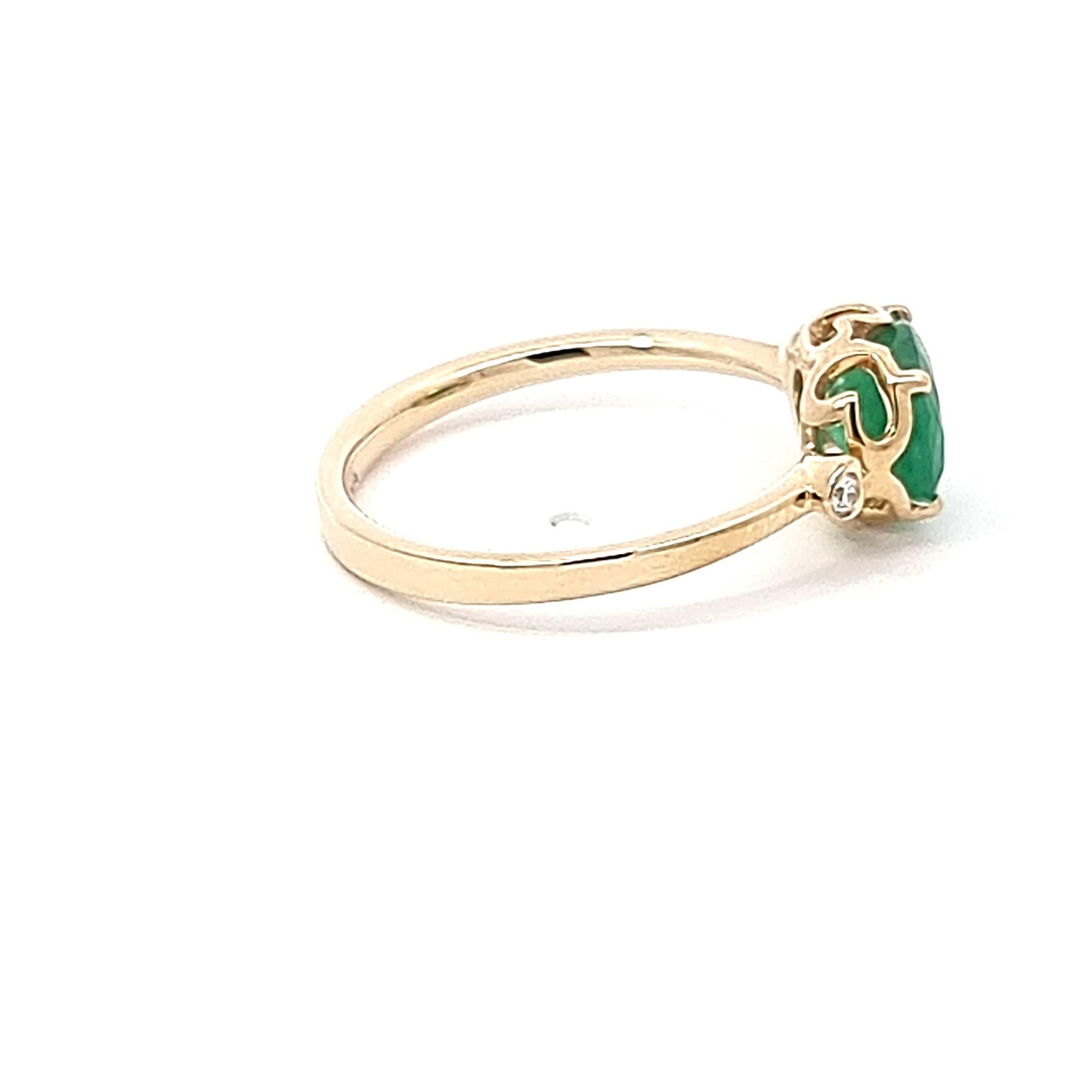 Elevate your elegance with our 14K Yellow Gold Ring, a luxurious expression of refined taste and timeless beauty. The focal point, a resplendent oval emerald weighing 1.16 carats, exudes a captivating green allure. The delicate shank, crafted with