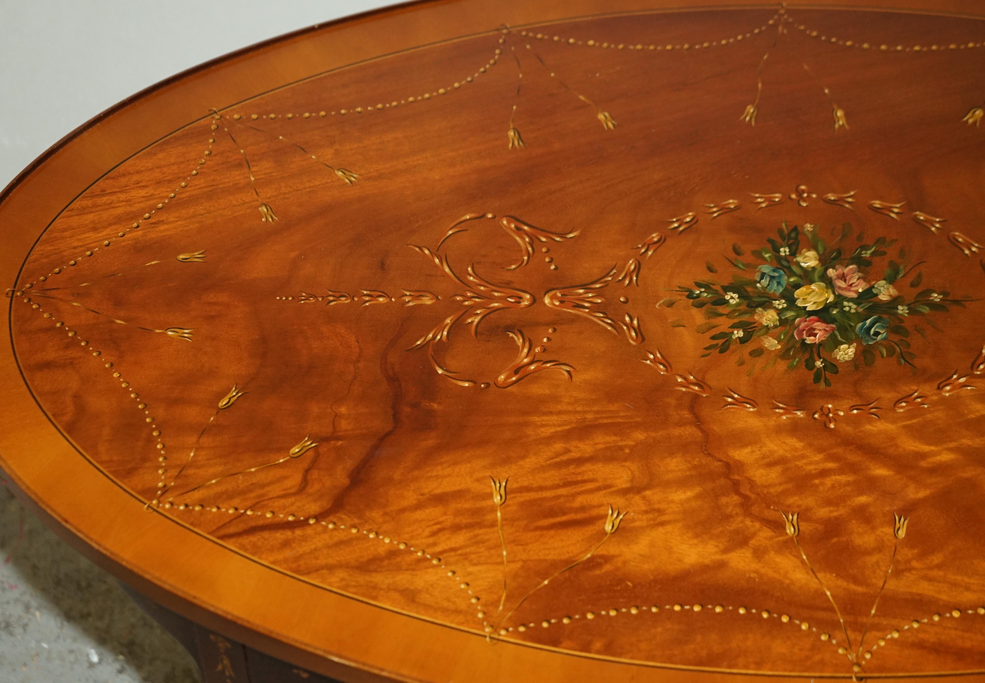 Stunning Oval Hardwood Coffee Table With Splayed Legs Decorative Floral Detail 4