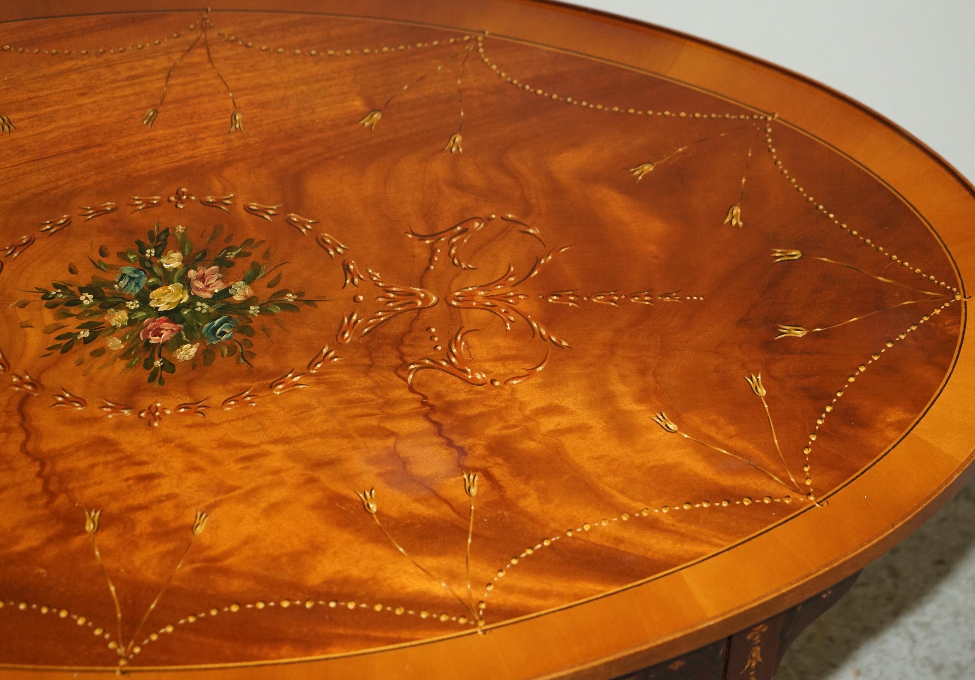 Stunning Oval Hardwood Coffee Table With Splayed Legs Decorative Floral Detail 5