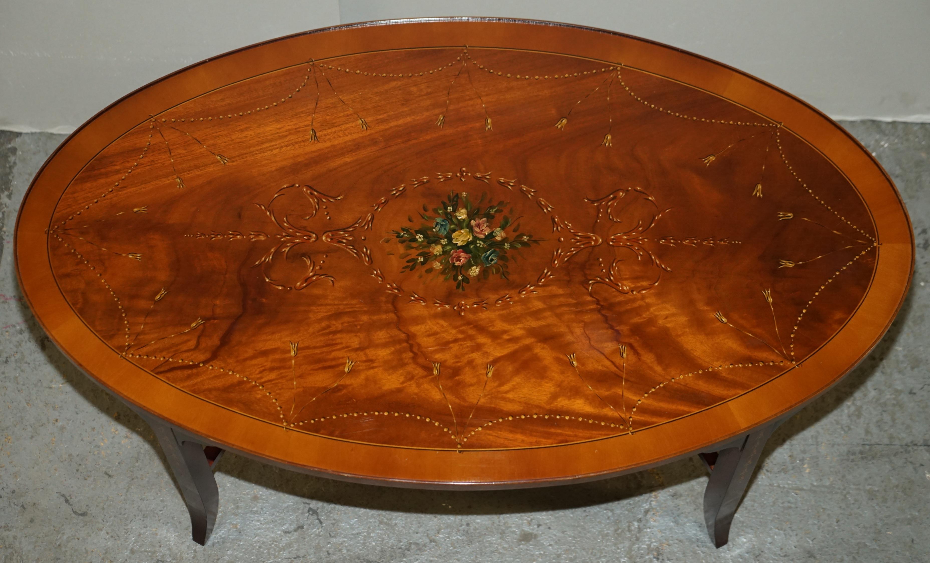 Stunning Oval Hardwood Coffee Table With Splayed Legs Decorative Floral Detail 3