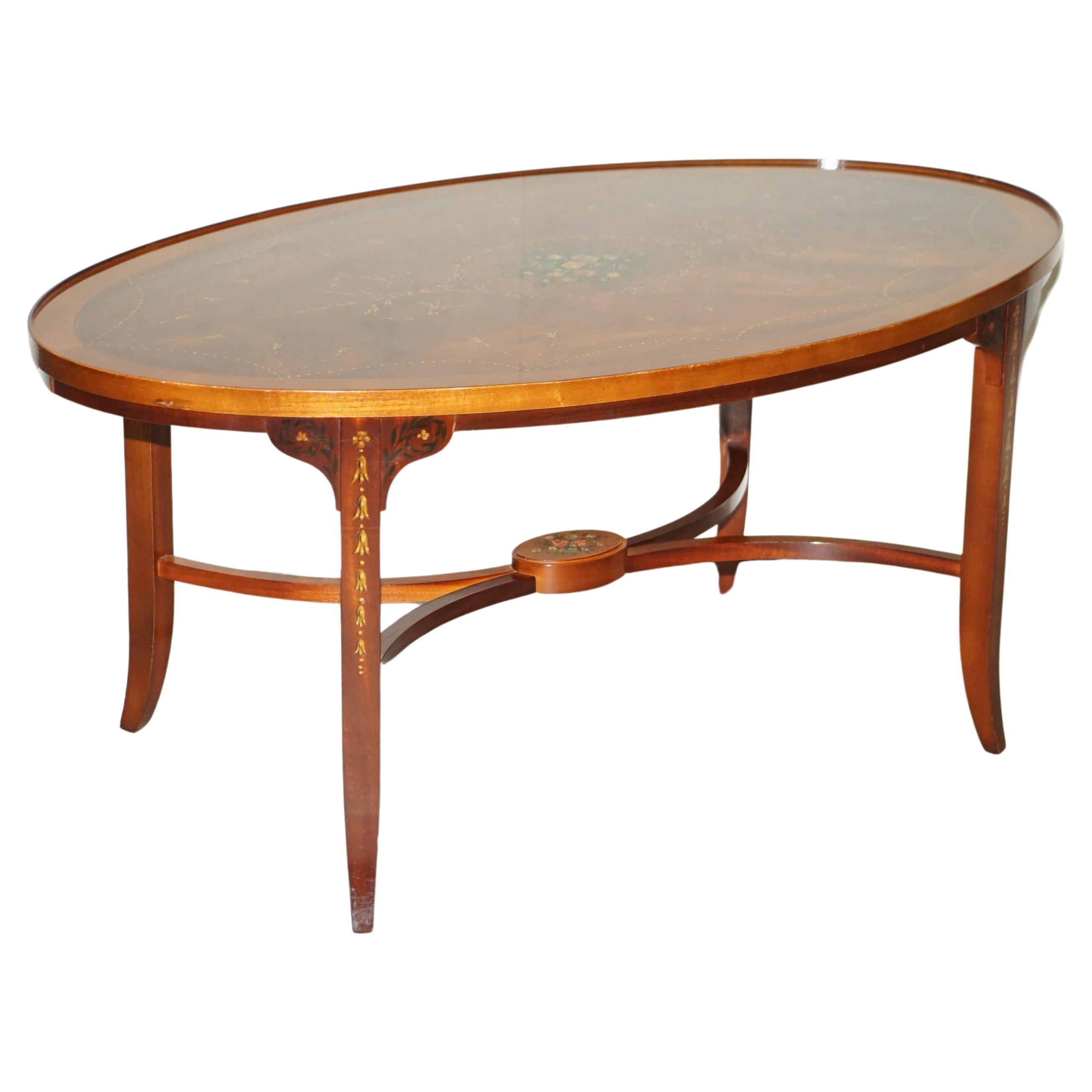 Stunning Oval Hardwood Coffee Table With Splayed Legs Decorative Floral Detail