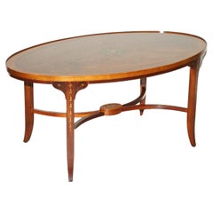 Stunning Oval Hardwood Coffee Table With Splayed Legs Decorative Floral Detail