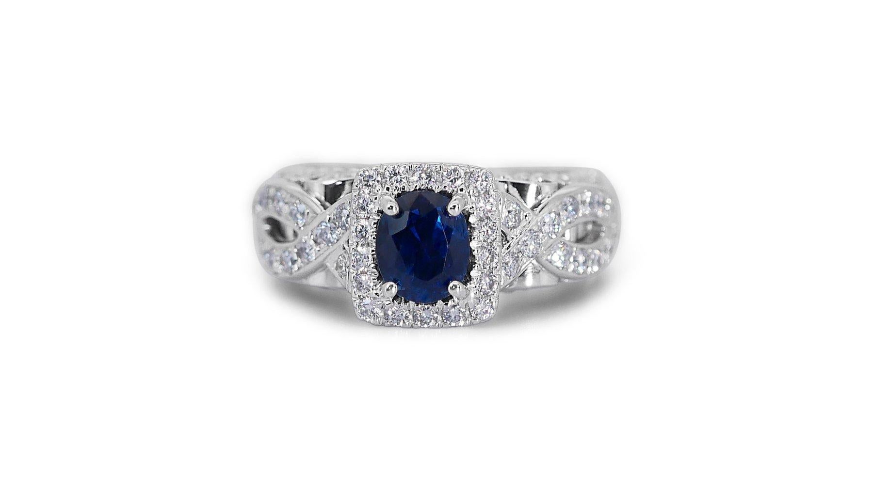 Stunning Oval Shape Natural Sapphire Ring set in 18K White Gold For Sale 1