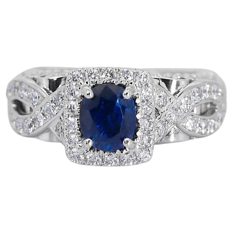 Stunning Oval Shape Natural Sapphire Ring set in 18K White Gold For Sale