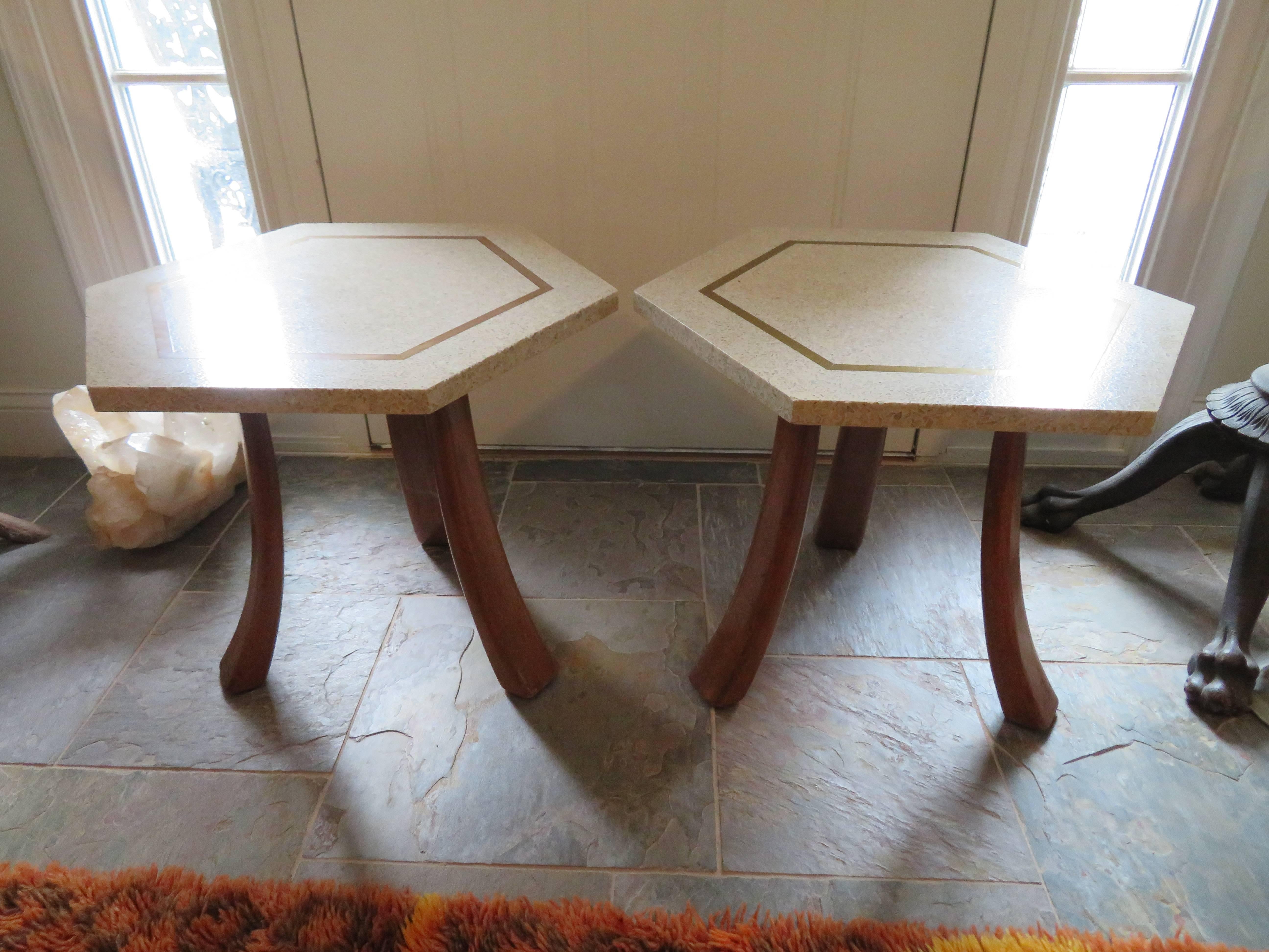 Wonderful pair of three-legged Harvey Probber side or end tables with original hexagonal terrazzo top with inlaid brass. Sculpted bleached mahogany legs with bleached mahogany supports. We do have a single available also if your looking for a set of
