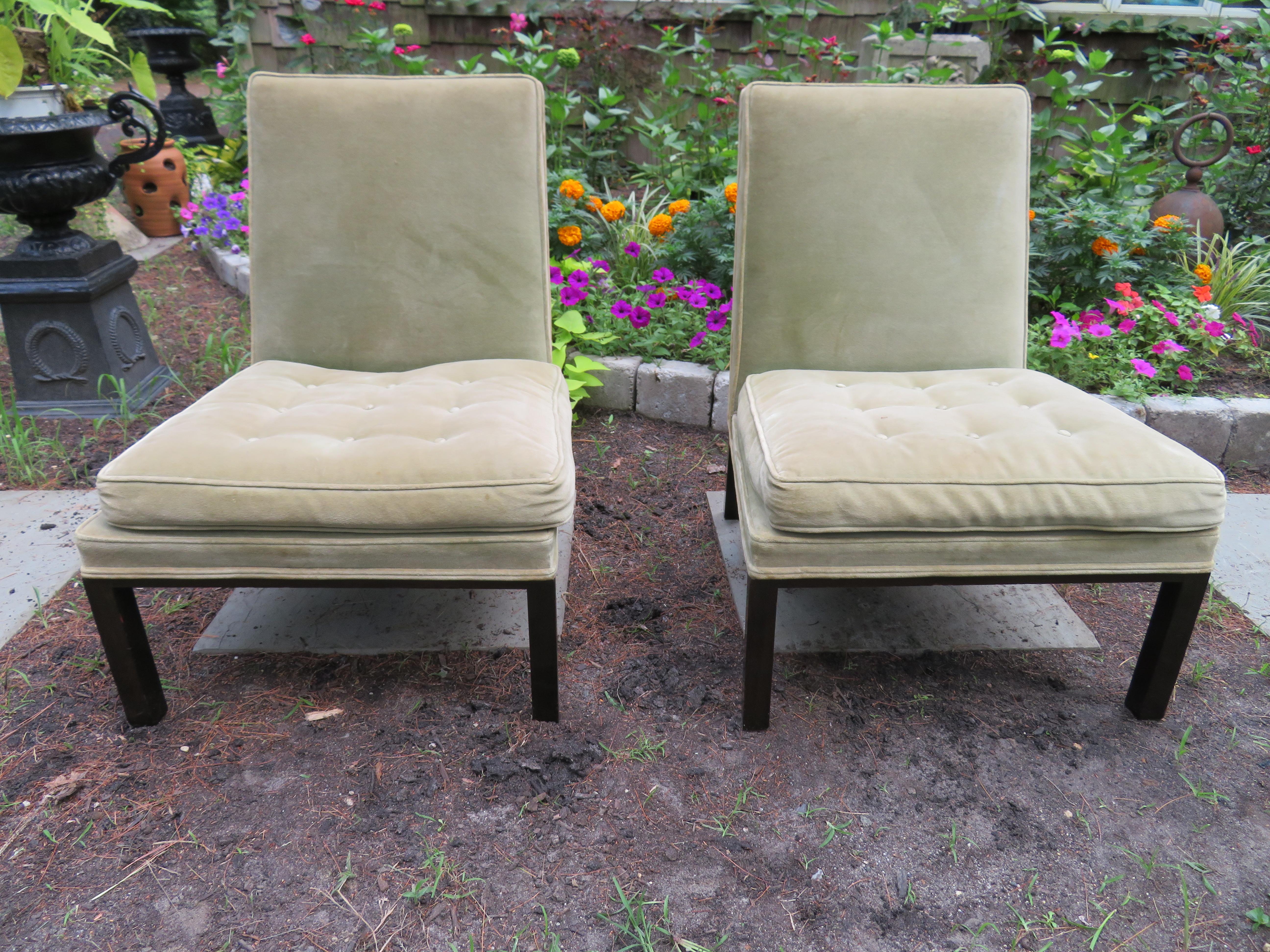 Stunning Pair of Harvey Probber slipper chairs with simple dark walnut frames. Wedge-shaped, sharp, square back, emphasized by exposed chair frame extending around the entire back- semi-attached seat cushion.