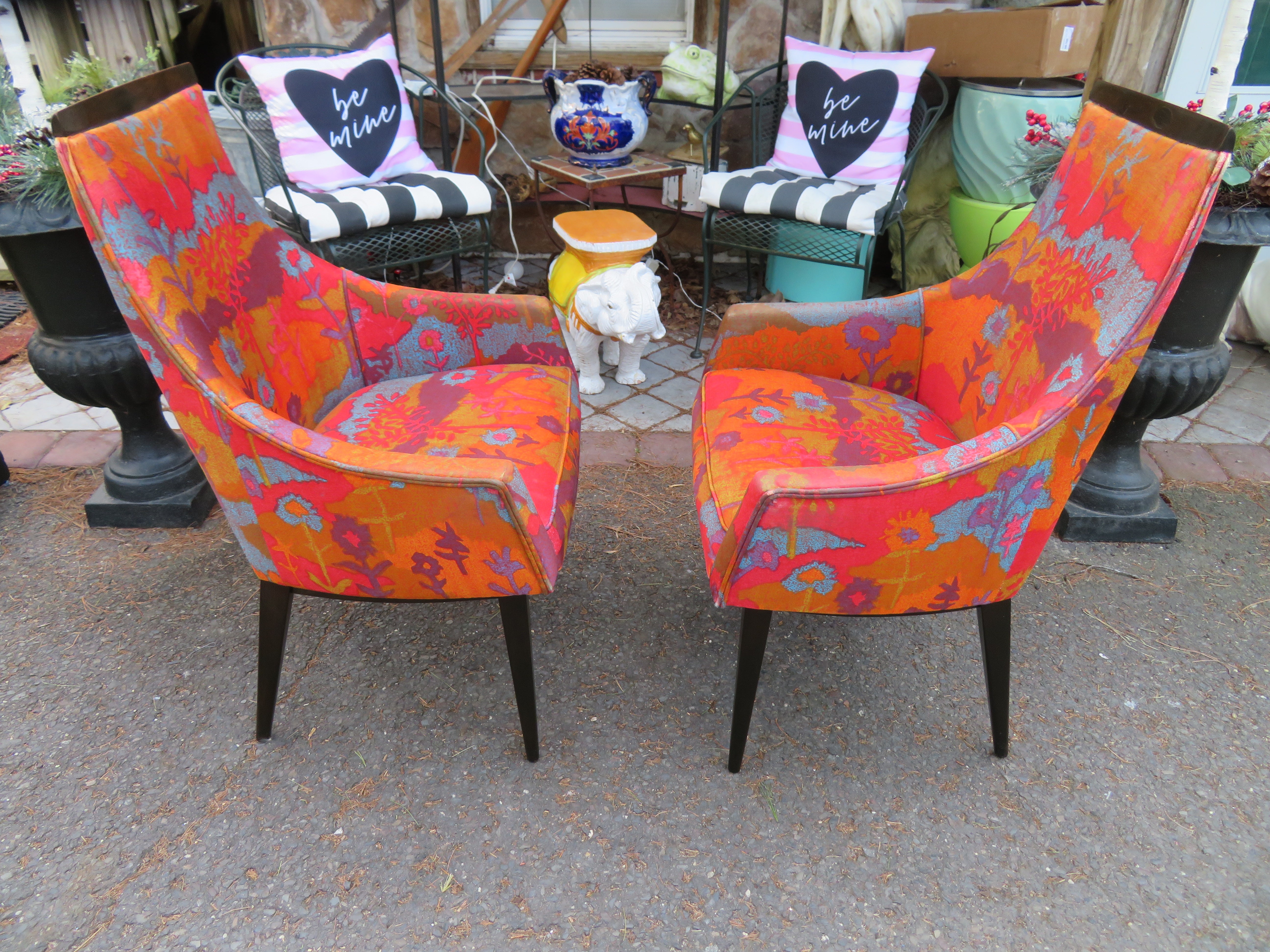 Stunning pair of Jack Lenor Larsen dining chairs, designed by Kipp Stewart for Calvin, American, circa 1960s. The original Larsen fabric is amazing, vibrant, and in relatively good condition -some wear to the piping at the top. They measure 38