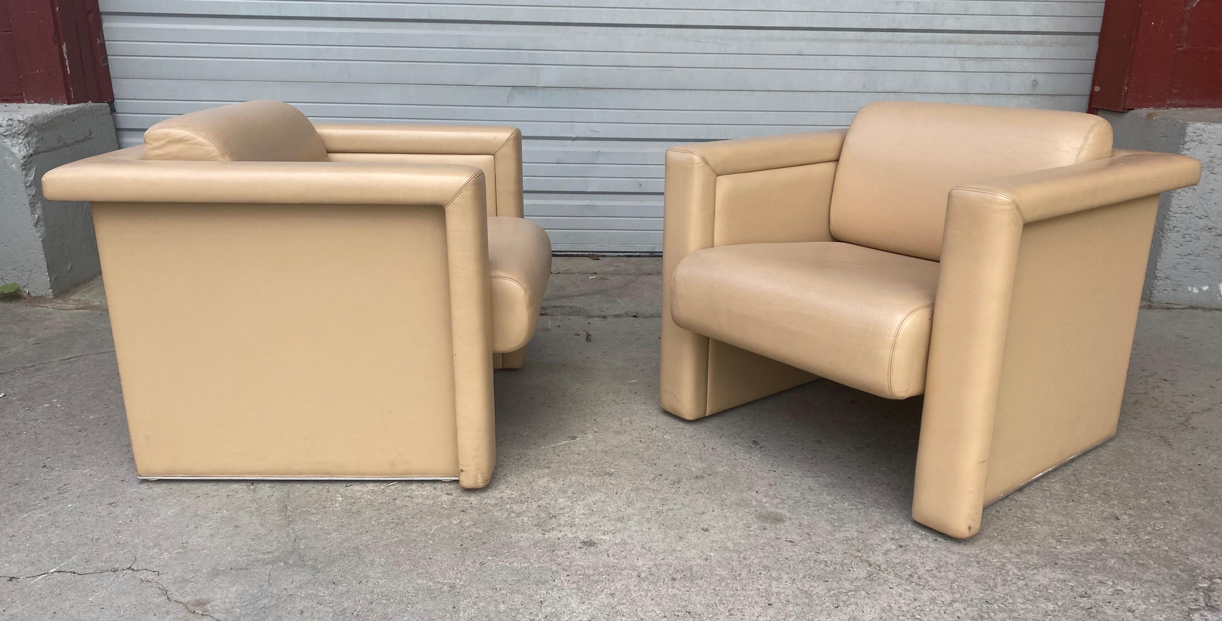 Stunning pair of leather chairs. Tobia Scarpa for Knoll, made in Italy.....Nice original condition, amazing quality / construction, stainless steel bases, retain original Knoll labels, hand delivery avail to New York City or anywhere en route from