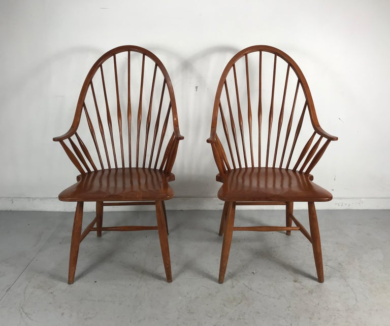 Stunning pair of modernist tall spindle back Windsor chairs, Quality construction, all spindles doweled through beautifully sculpted arched back, Amazing design, retain original warm maple /birch wood finish, wonderful patina, elegant styling, hand