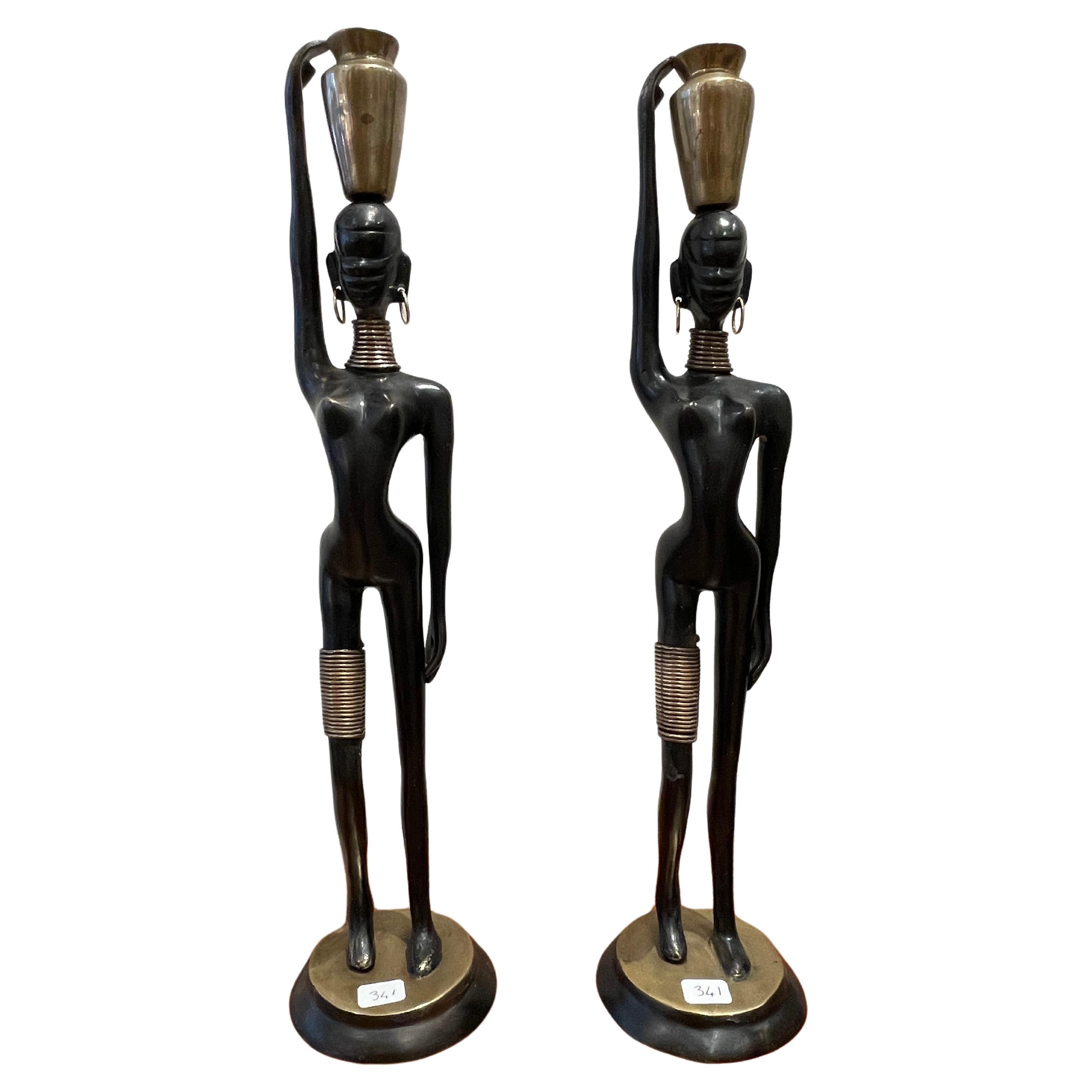 Stunning pair of African lady carrying water, in the style of  Hagenauer 1970 For Sale