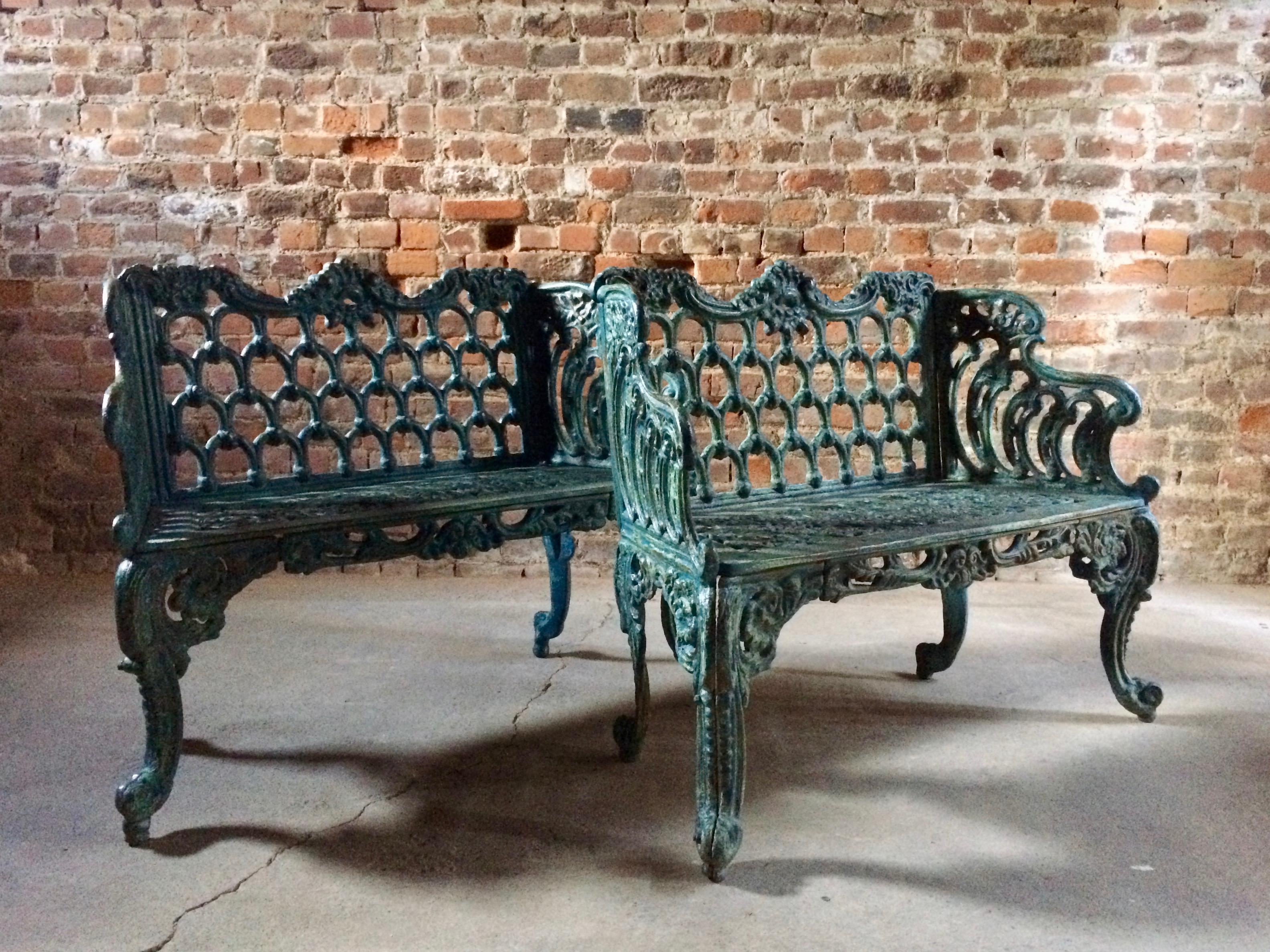 A pair of breathtakingly beautiful antique benches made from cast iron in the Coalbrookdale style dating to late 19th century.

The benches are rich in age and history and boast a wonderful patina that can only come naturally over time.

These